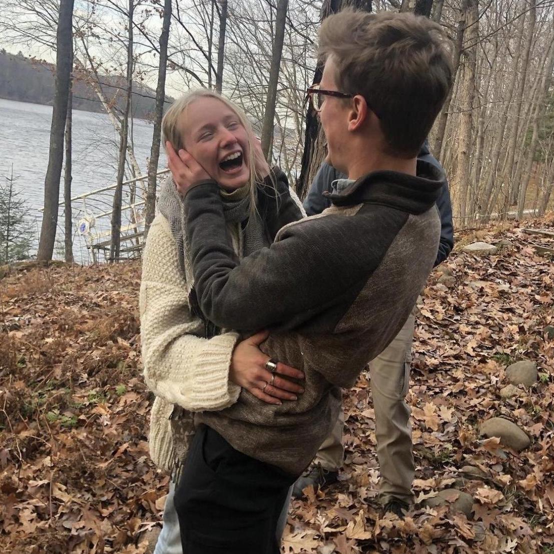 Moments after Ethan proposed AND revealed both sets of parents and siblings hiding nearby to congratulate us!