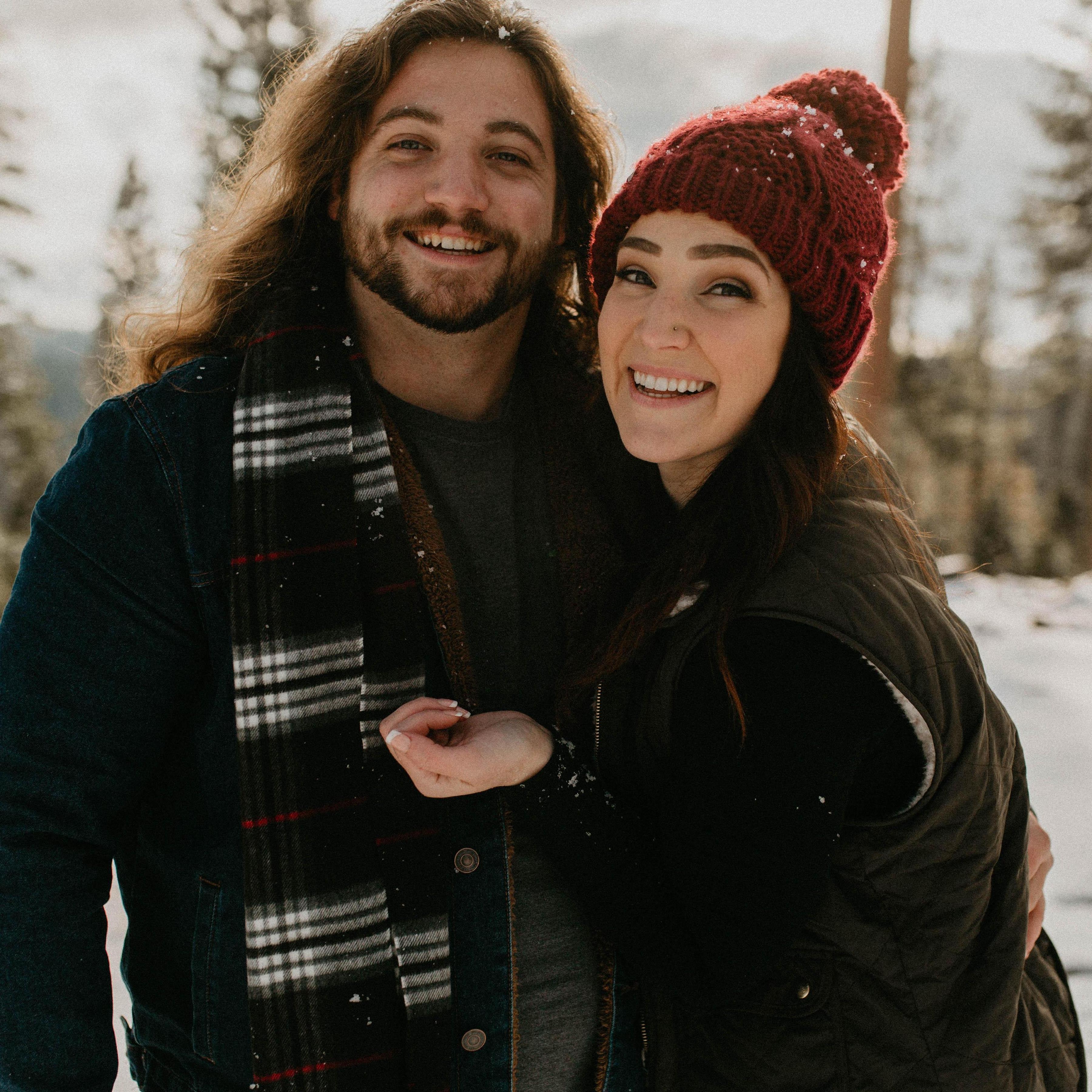 Post-snowball fight snapshot in the middle of our snowy engagement photos session.