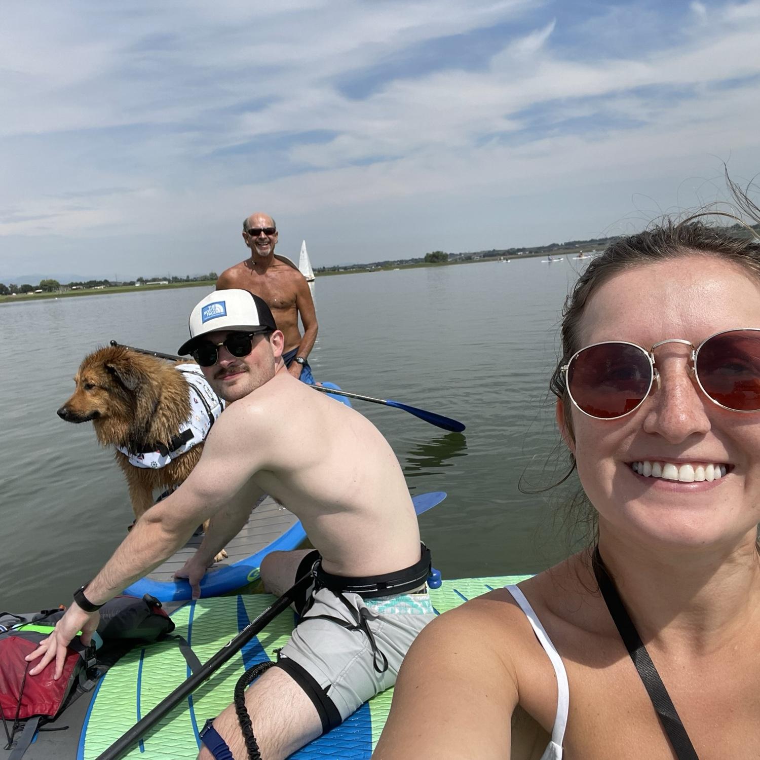 Paddle-boarding with Larry and the pack! August 2022