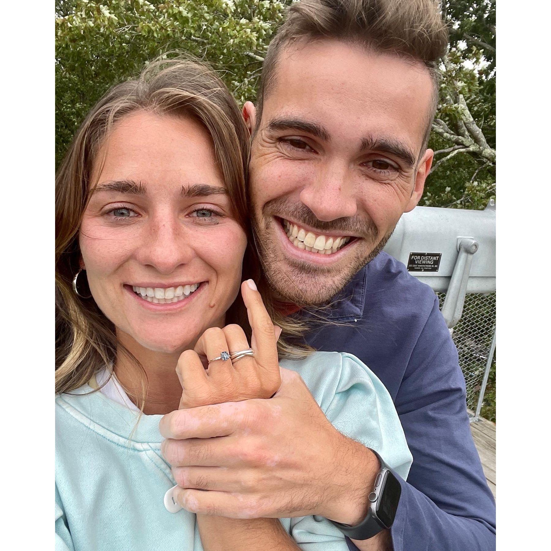 Minutes after Will got down on one knee! On top of a wildlife viewing tower at Great Meadows Wildlife Refuge in Concord MA.