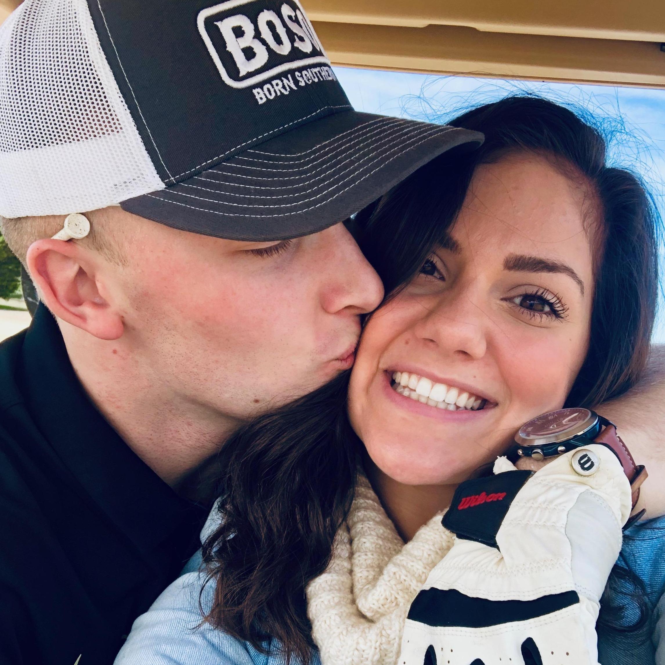 He's trying to turn me into a golf girl :)