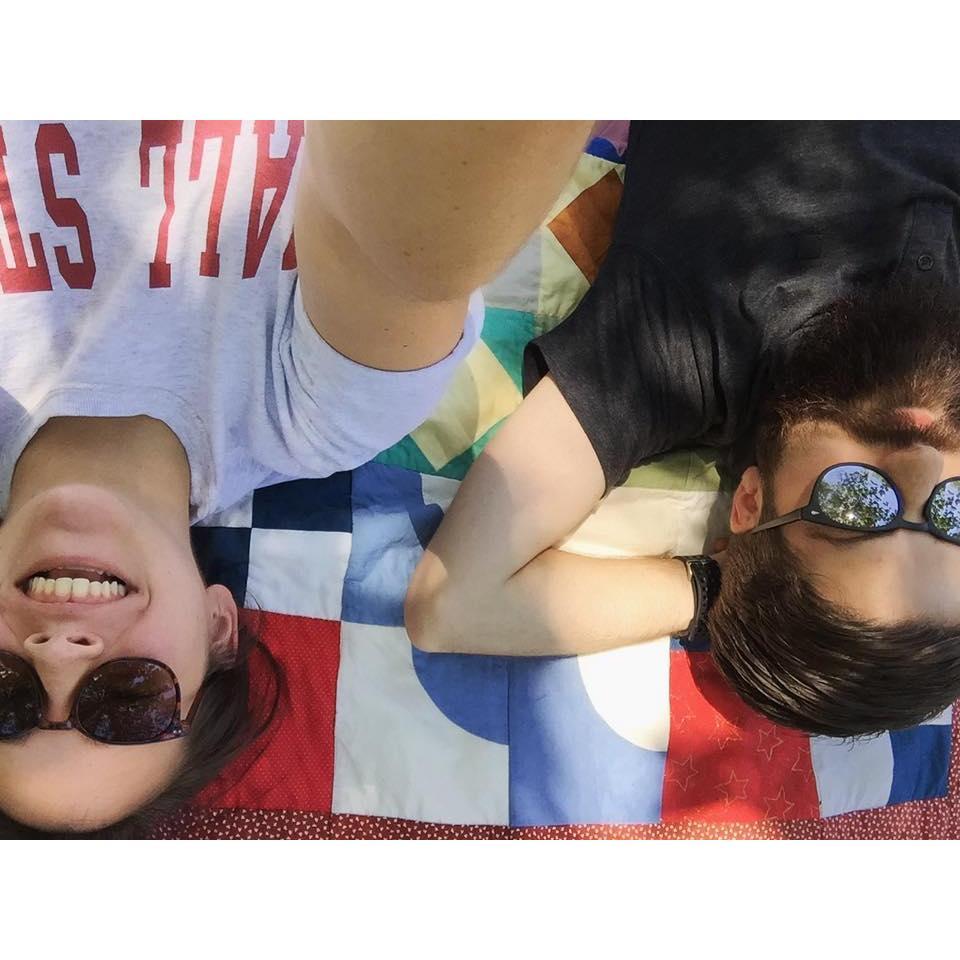 National Picnic Day in undergrad with Alec. His Grandma Goshorn gave us that quilt, and it lives on our couch now.