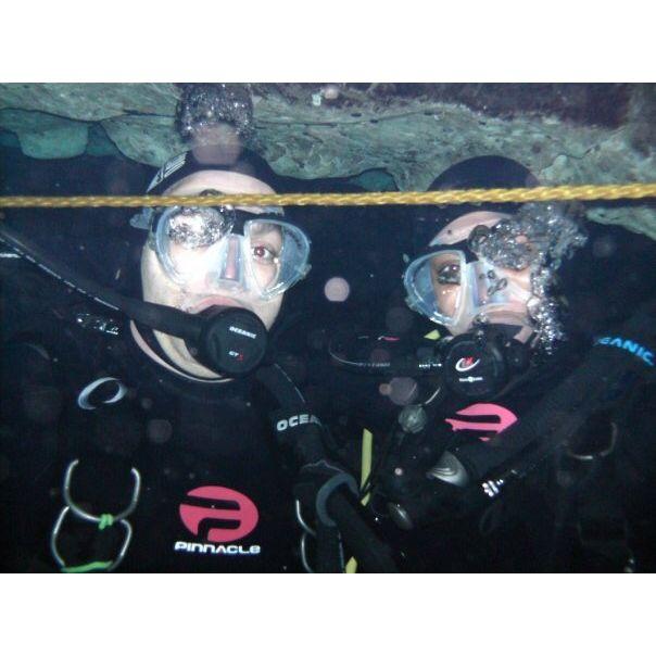 One of our many adventures together....scuba diving 100ft down at Devil's Den.