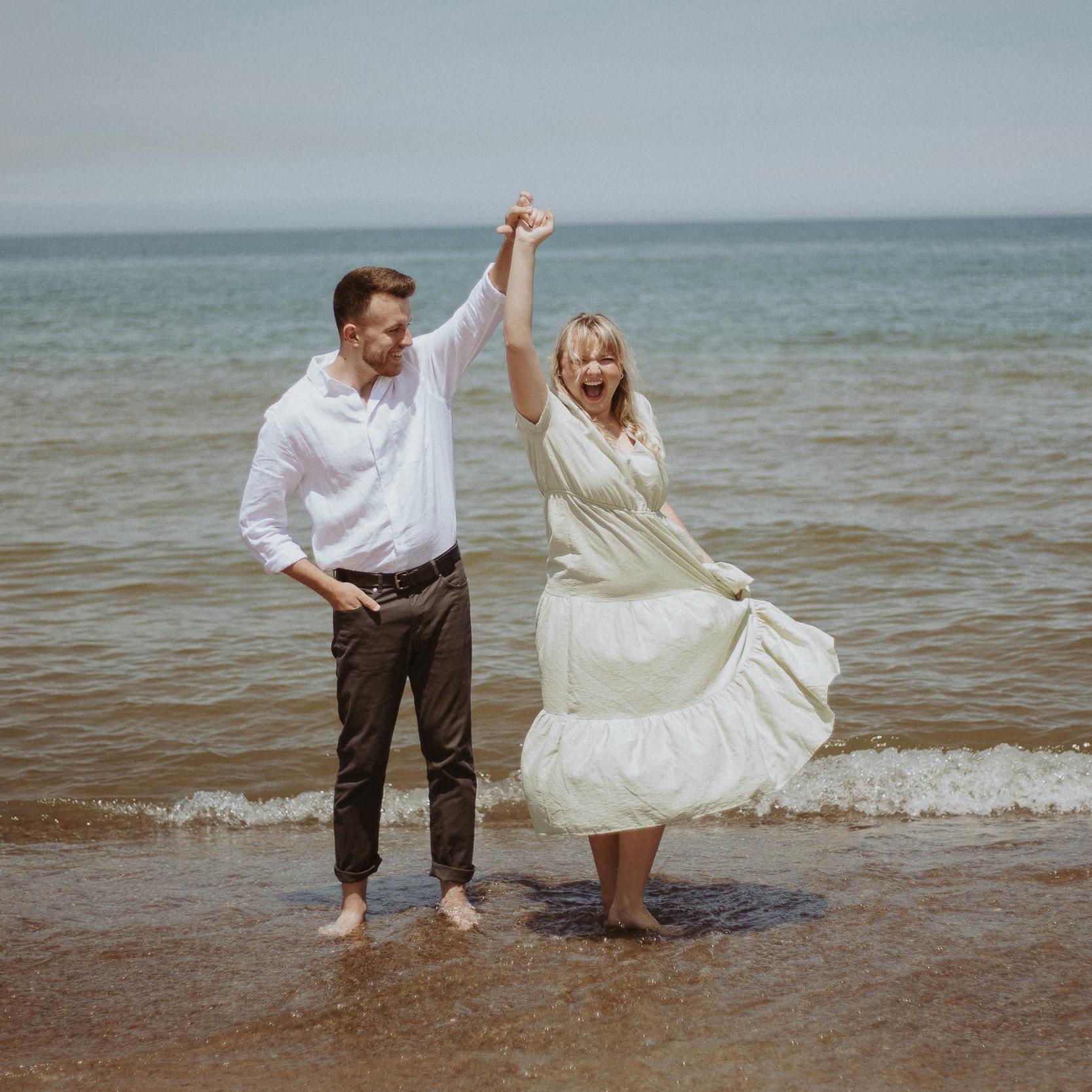 Lake Michigan was FREEZING the day we did our engagement pictures!