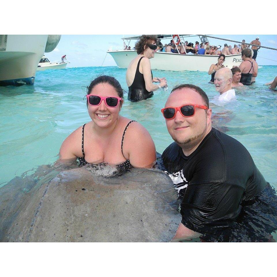 Sting Ray City!  Off The coast of Caymen Islands there is a sandbar where you can play with Sting Rays!!  2015
