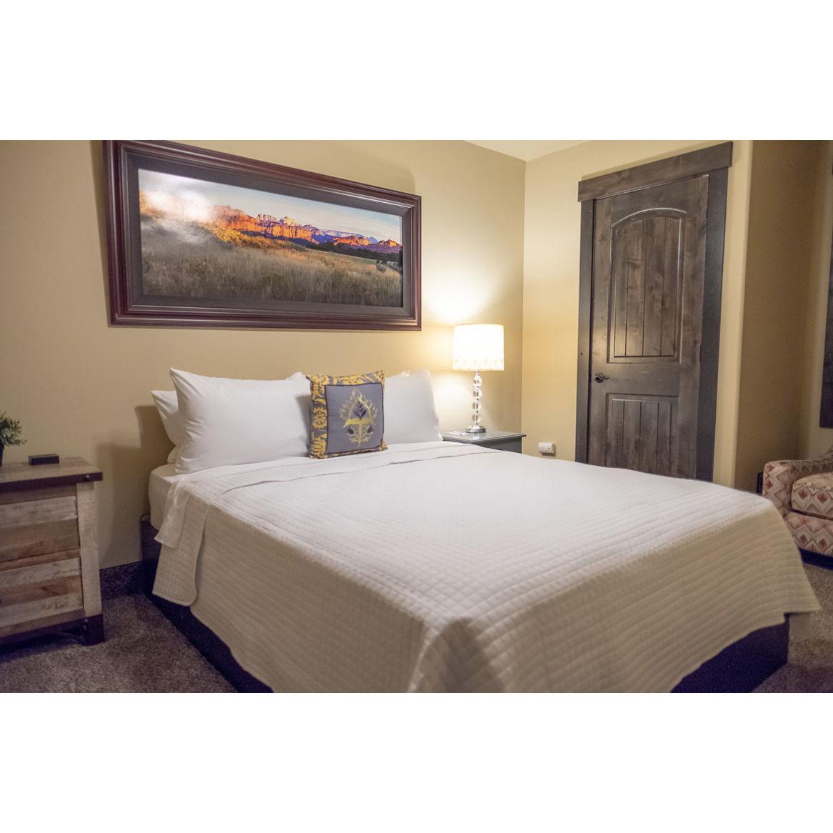 Bedroom 6 & 7. Each rooms are identical with a queen bed.