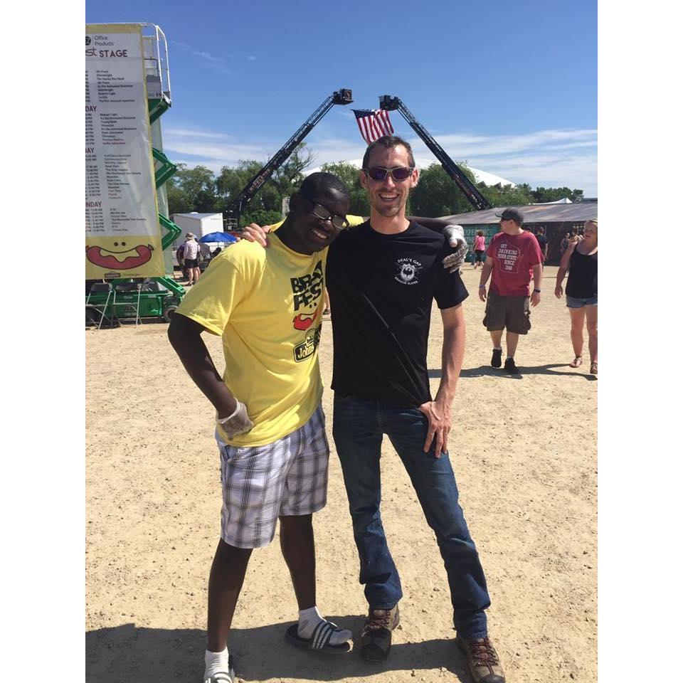 Random stranger that asked to take a picture with Adam when we went to Brat Fest in Madison.