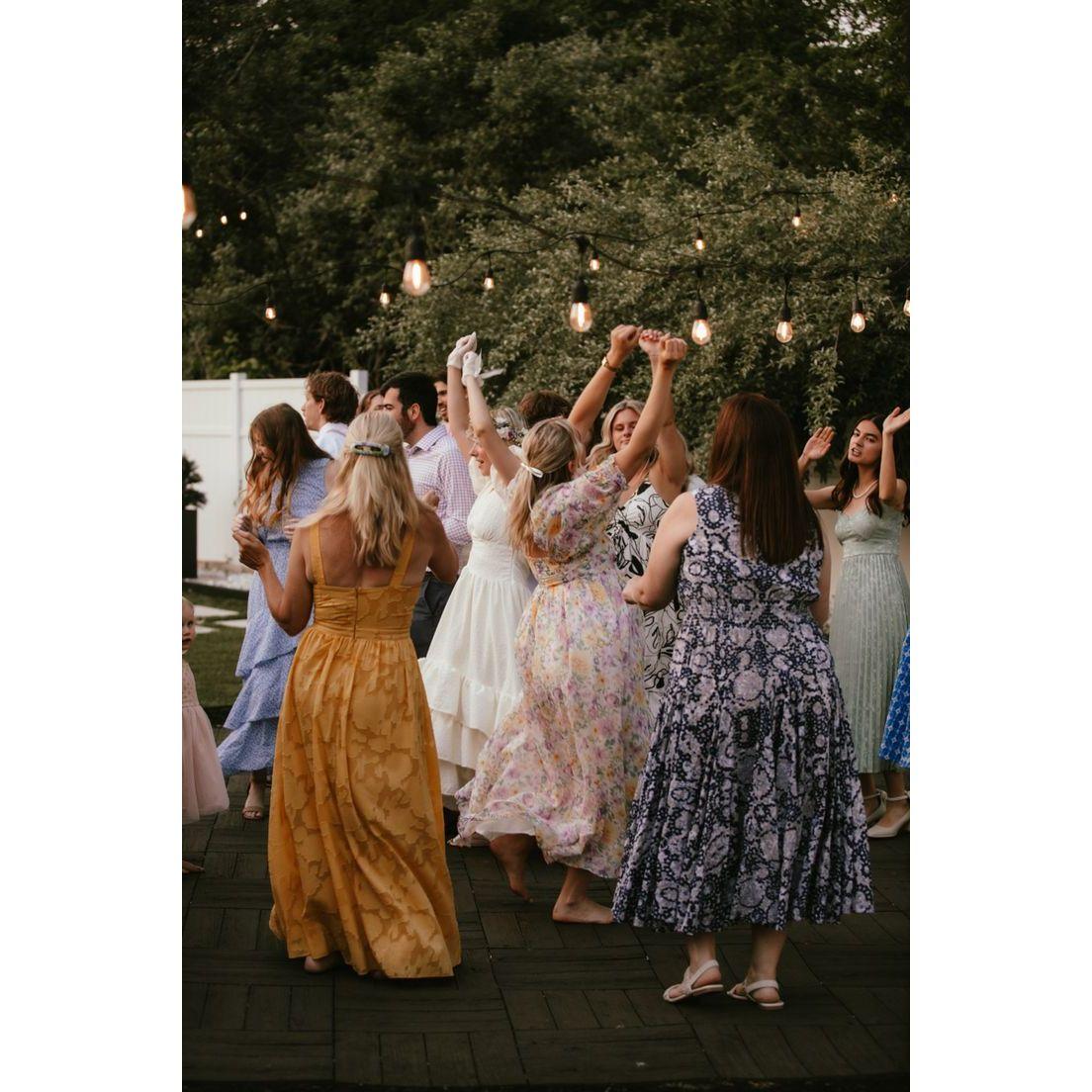 The ceremony and dinner will be in grass, so stiletto heels will sink!