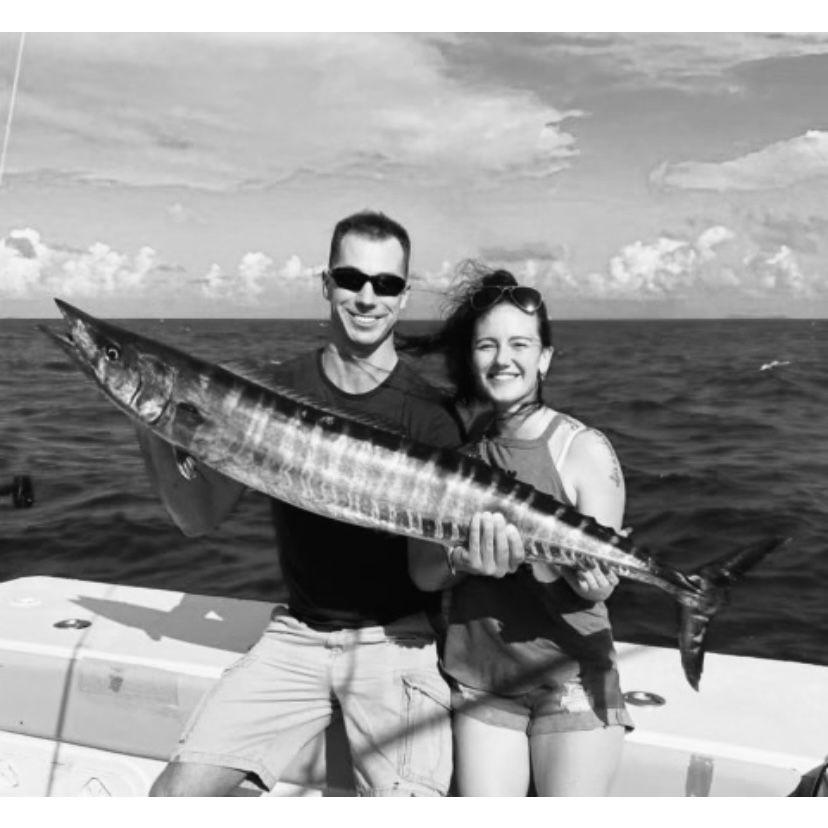 This is a Wahoo we caught in St. Thomas! I hooked him and broke my nail off on the reel. I had to tap out to stop the bleeding, and Mike brought him in! (Photo Credit: Joanna Quan Soon)