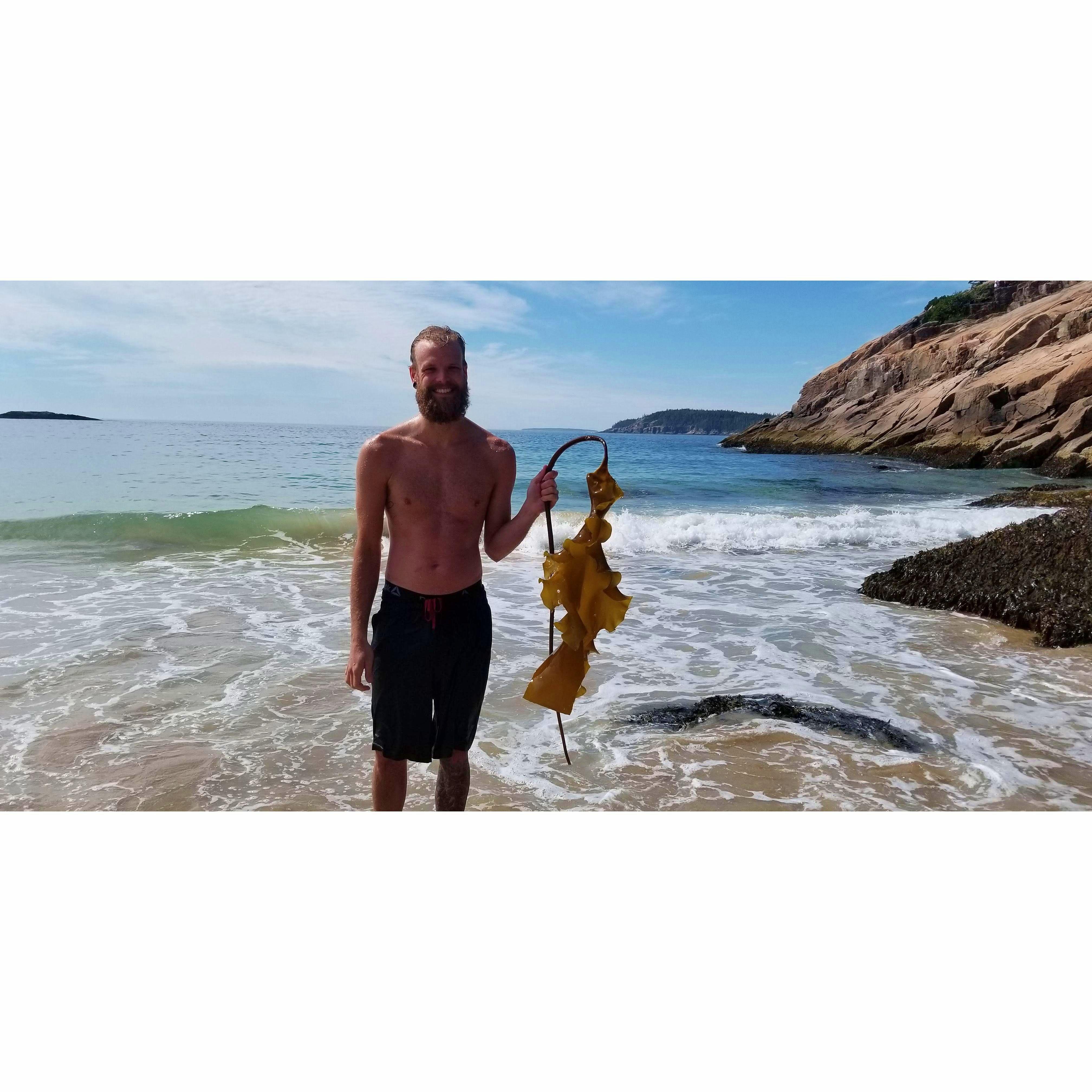 Andrew showing his romantic side with an ocean "flower". Acadia National Park, Maine
