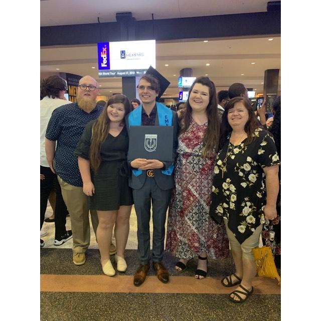 My cousin Jake's graduation in May 2019, Travis's first time in the FedEx Forum