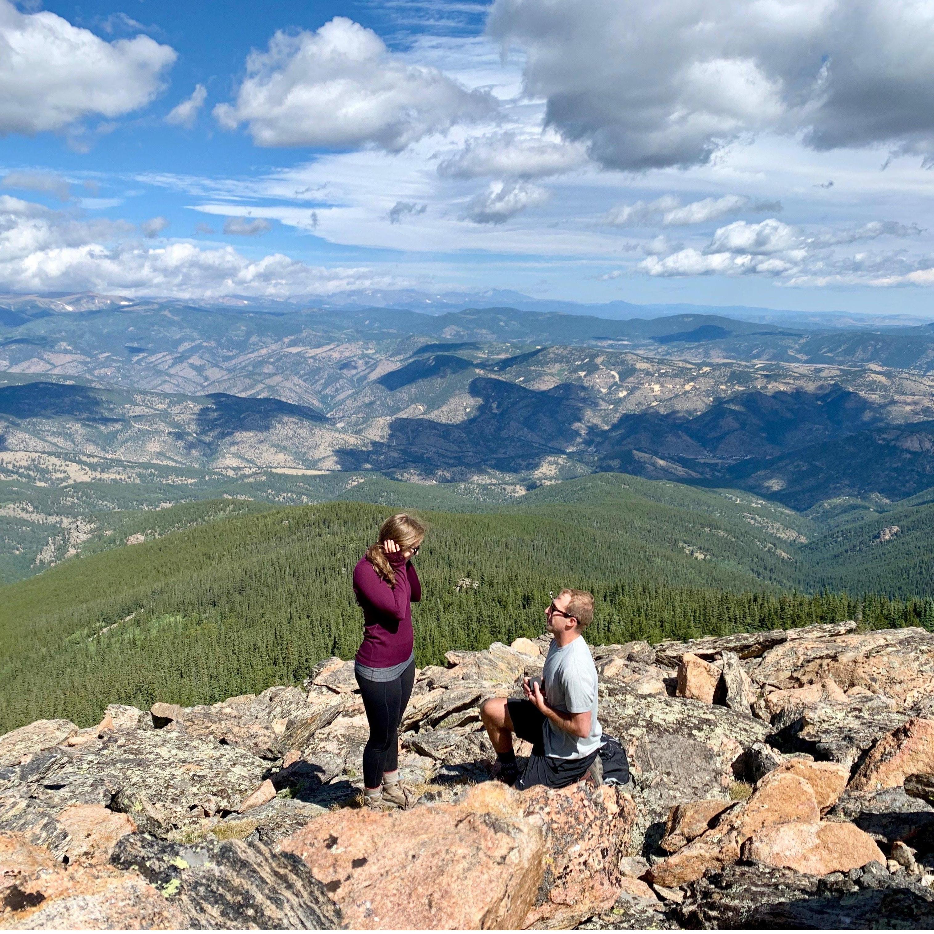John proposing on Chief Mountain (September 2019)