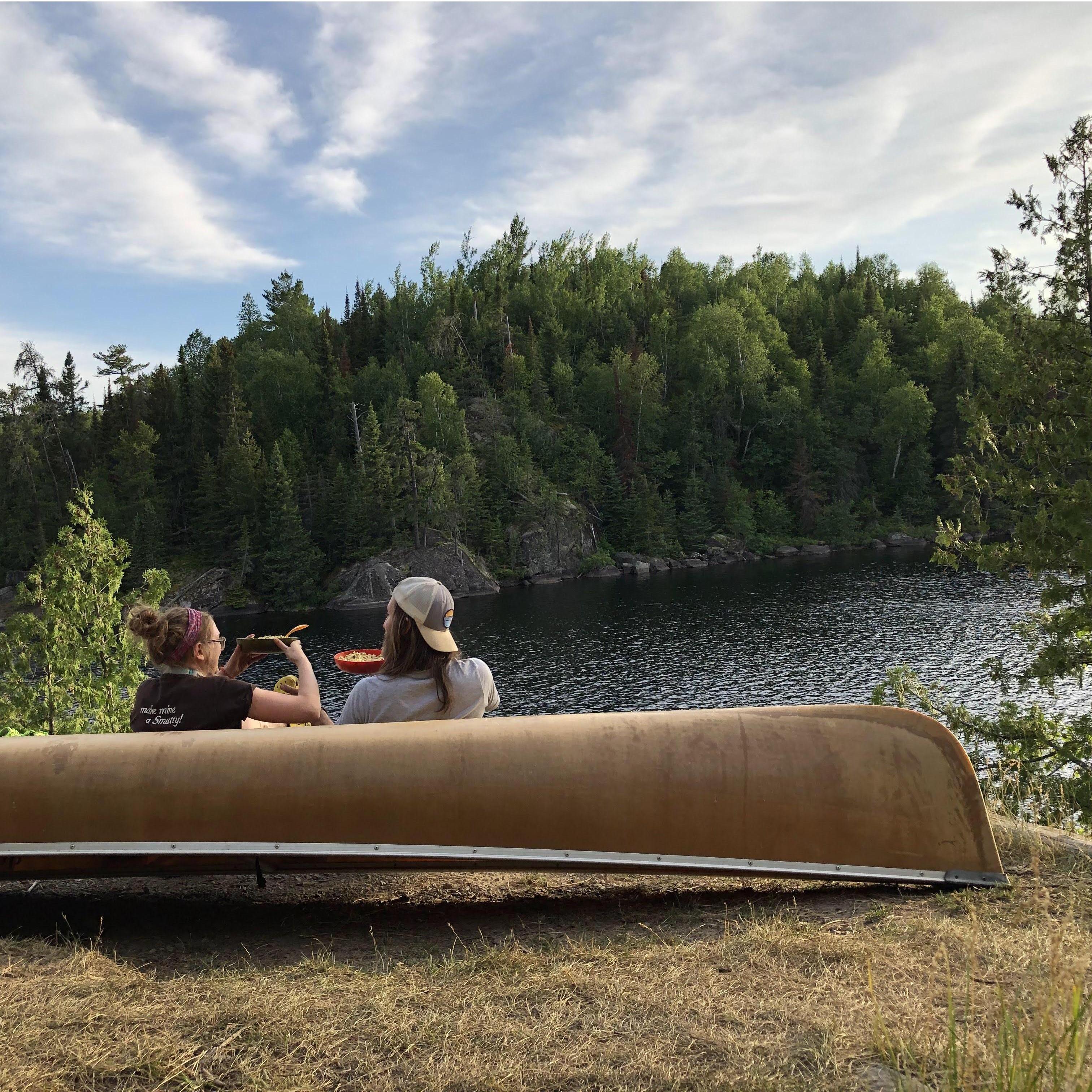 Wisini Lake in the BWCA. Mac&Cheese night with a view. What you cant see are the huge rocks slabs/cliff that we had to bring our gear up to get to this point.