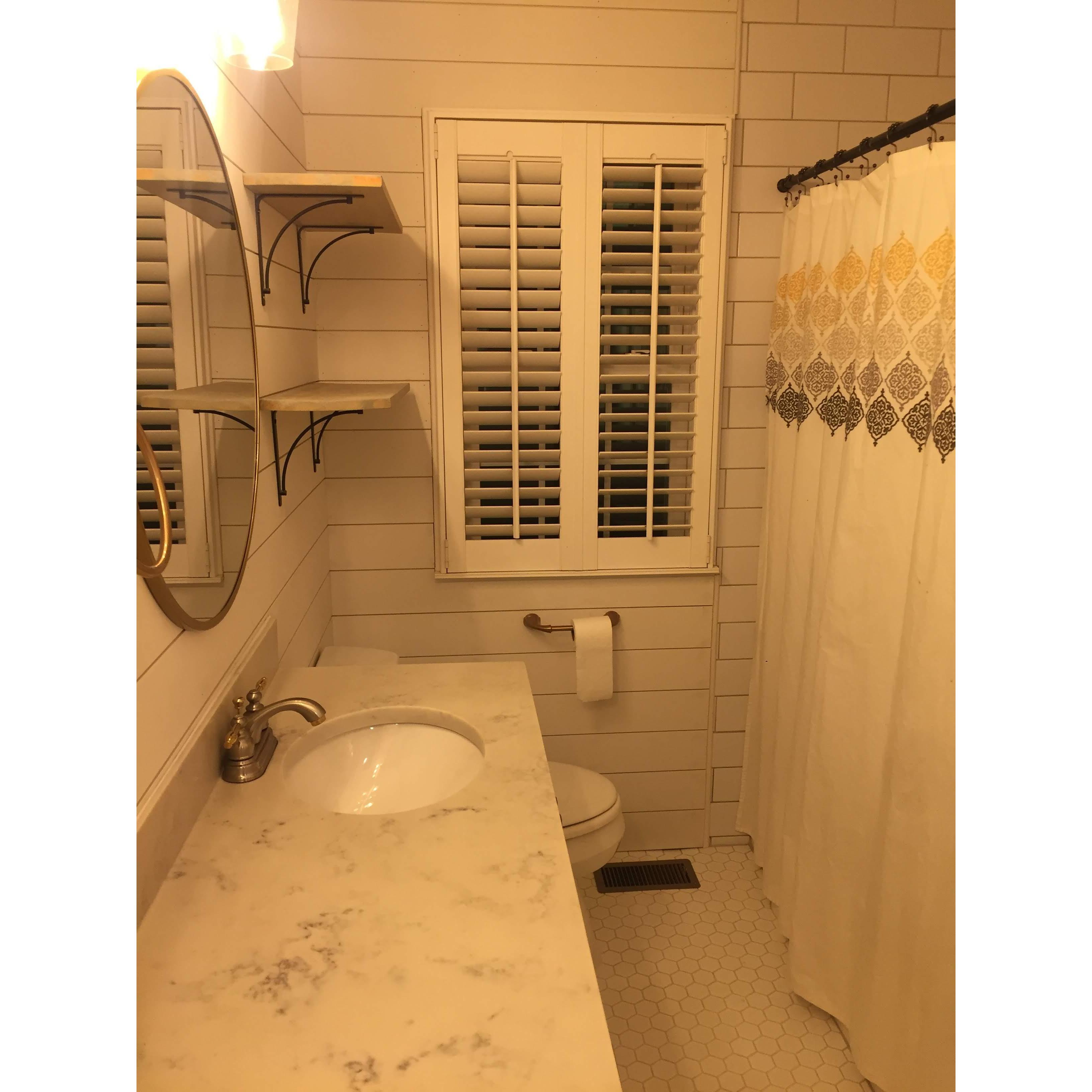 After months of debating whether to sell Mallory's tiny Homewood house or not, we decided to keep it and update the main bath!