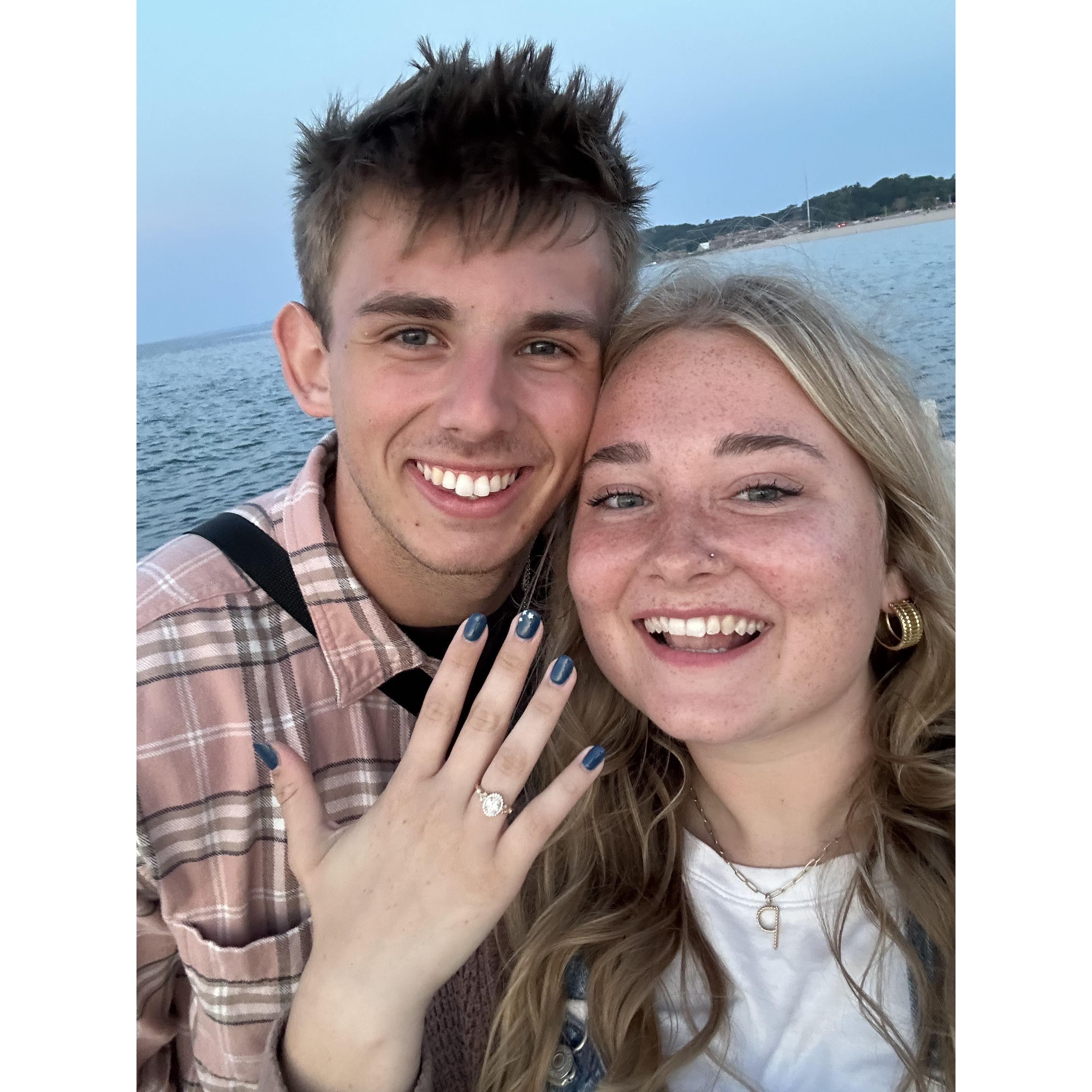 on July 4th he popped the question on the beach of Lake Michigan!