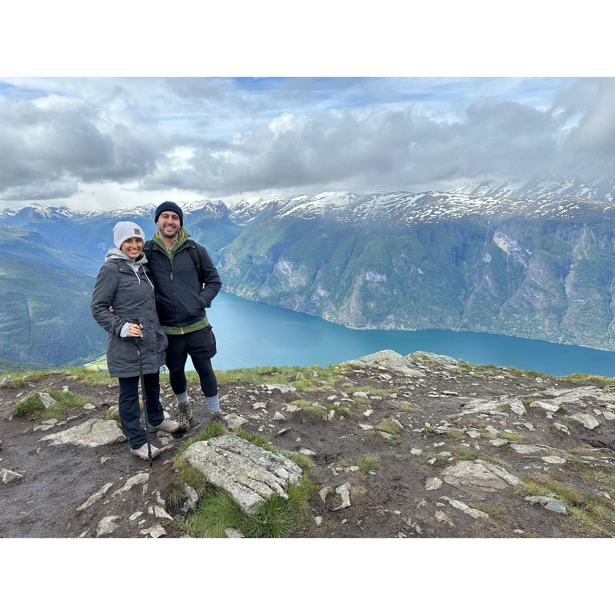 June 2024: Mark & Jen hike up Mt. Prest in Norway! How does he talk her into doing this stuff? She must really love him.