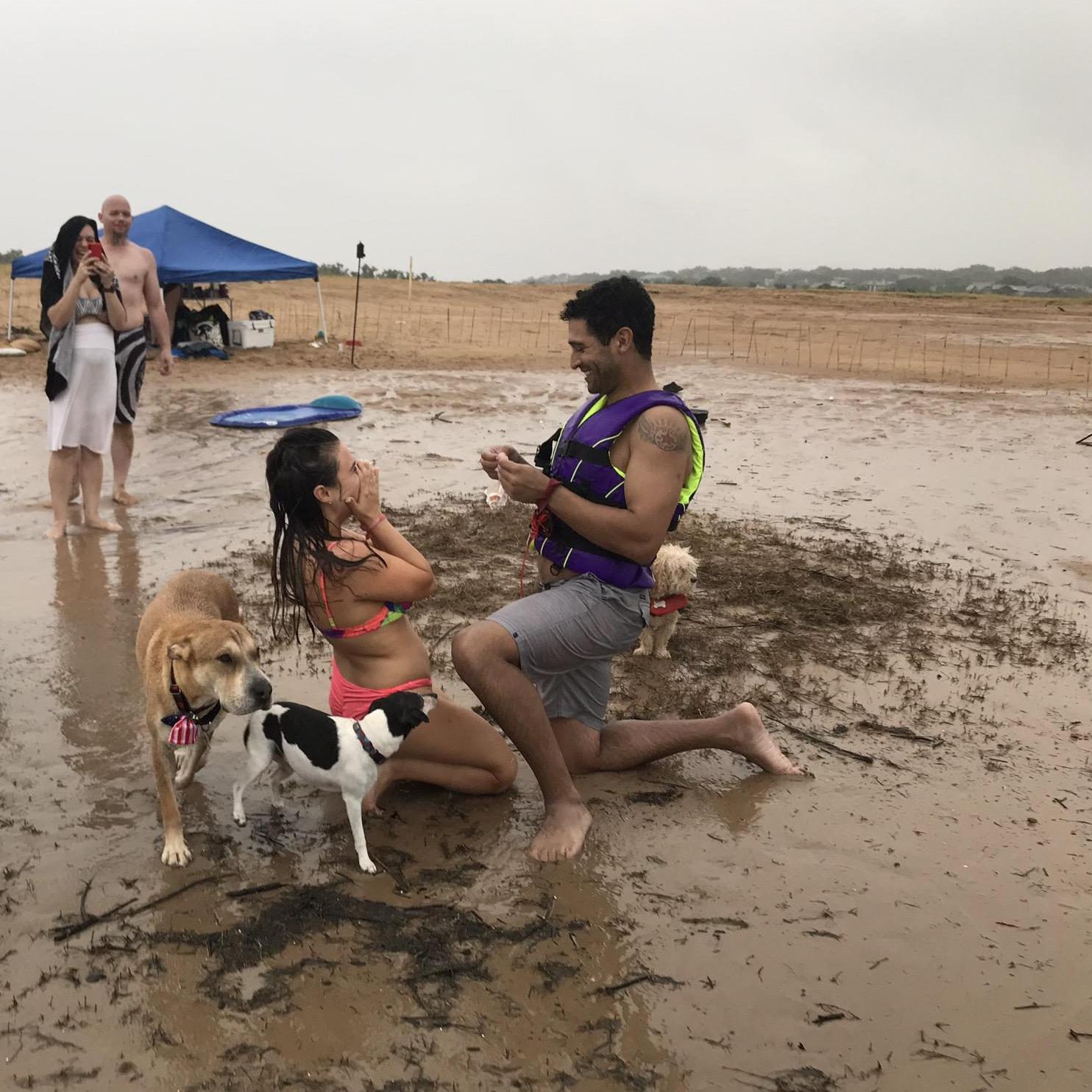 Our favorite picture from that day with Percy and Molly by our sides! Jet had tied the ring to a shell so after he proposed and it was still stuck I joined him down there still in shock.