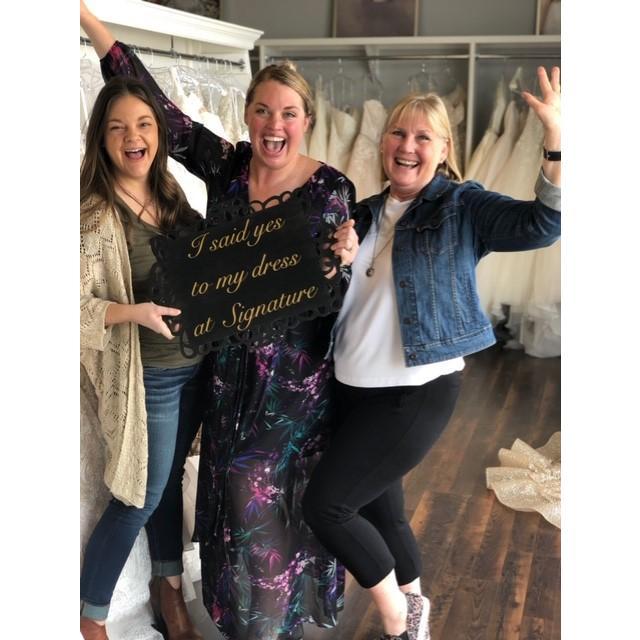 Sarah saying "YES" to the dress!