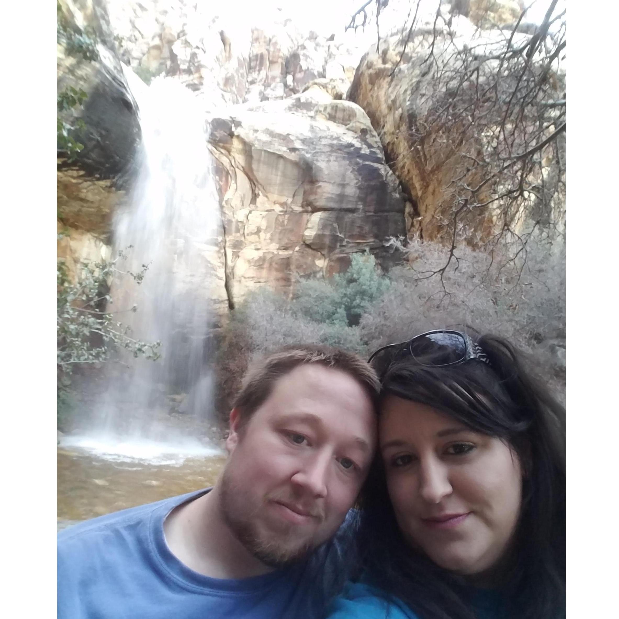 After a day of hiking and rock climbing we were exhausted but found a hidden waterfall coming out of the top of a rock at Red Rock Canyon in Las Vegas 2017.