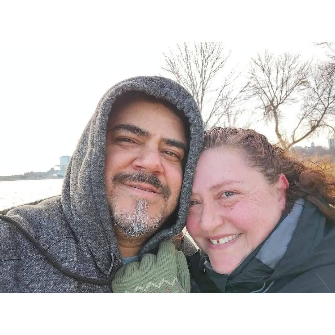 We were freezing in this picture, but it's the first official one of us as a couple.