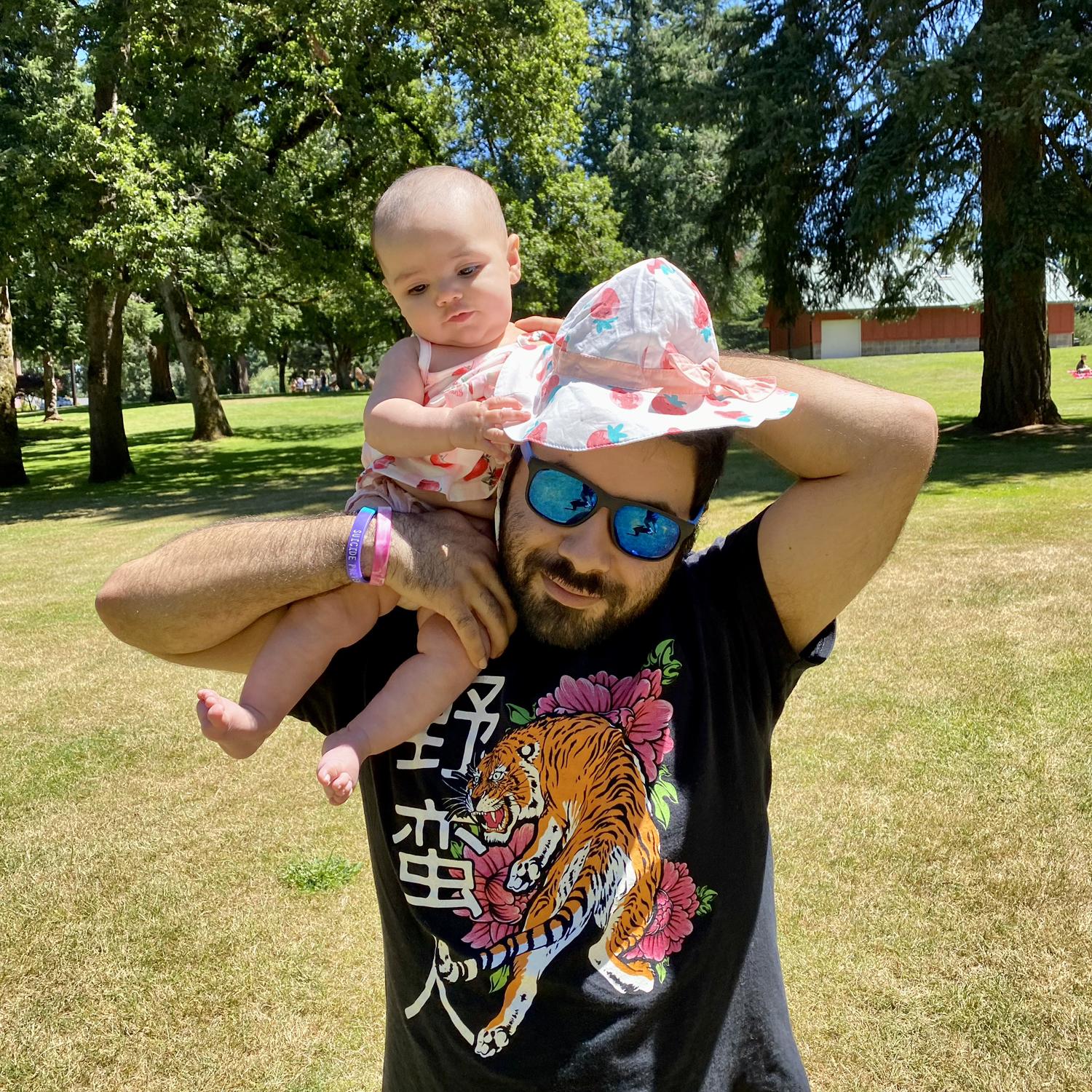 First family picnic at a park. Summer 2023