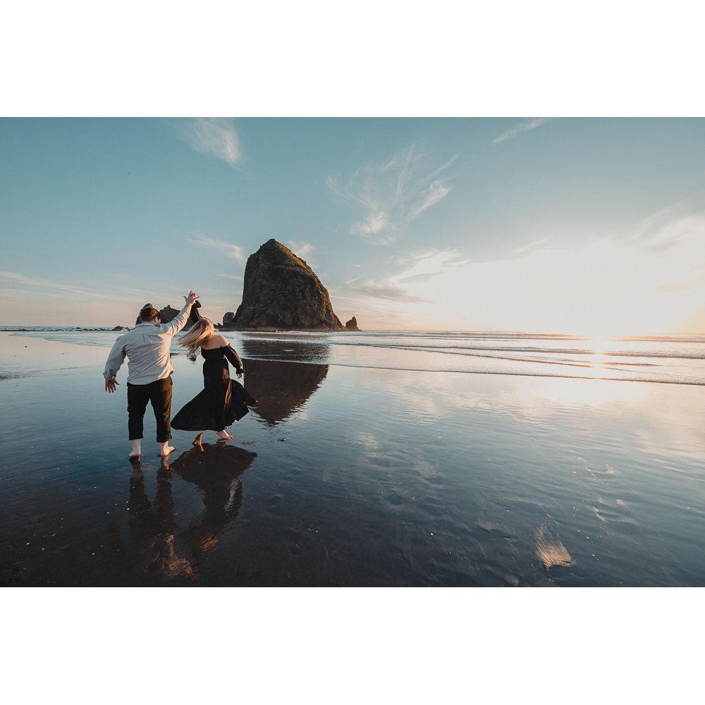 Dancing on the beach at sunset.