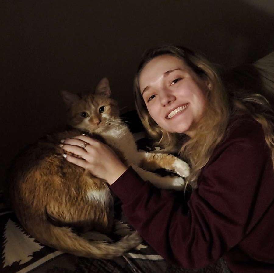 Carissa discovering a love for cats with Kitty! (January 2021)