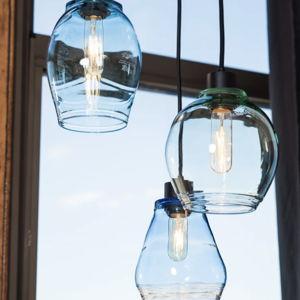 Wedding bottles recycled into lighting and vases
