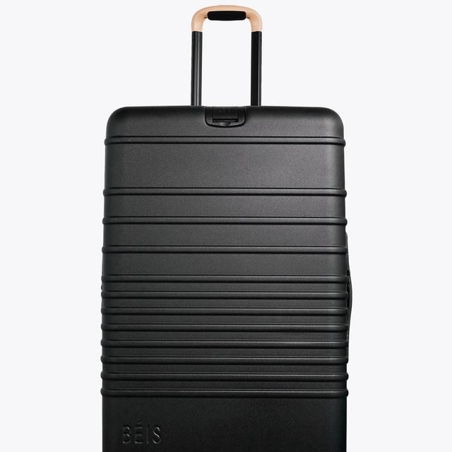 The Large Check-In Roller in Black/Beige