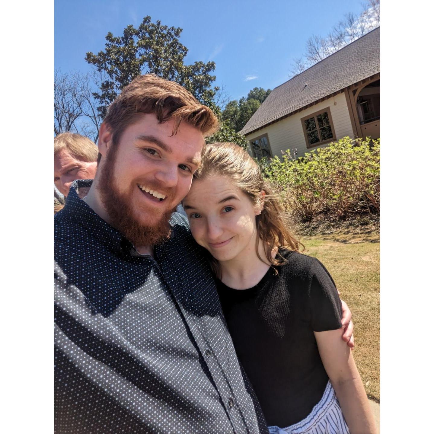 We just announced our engagement to our parish, St. John of the Ladder (you can see a corner of the parish hall in the background where our reception will be held).