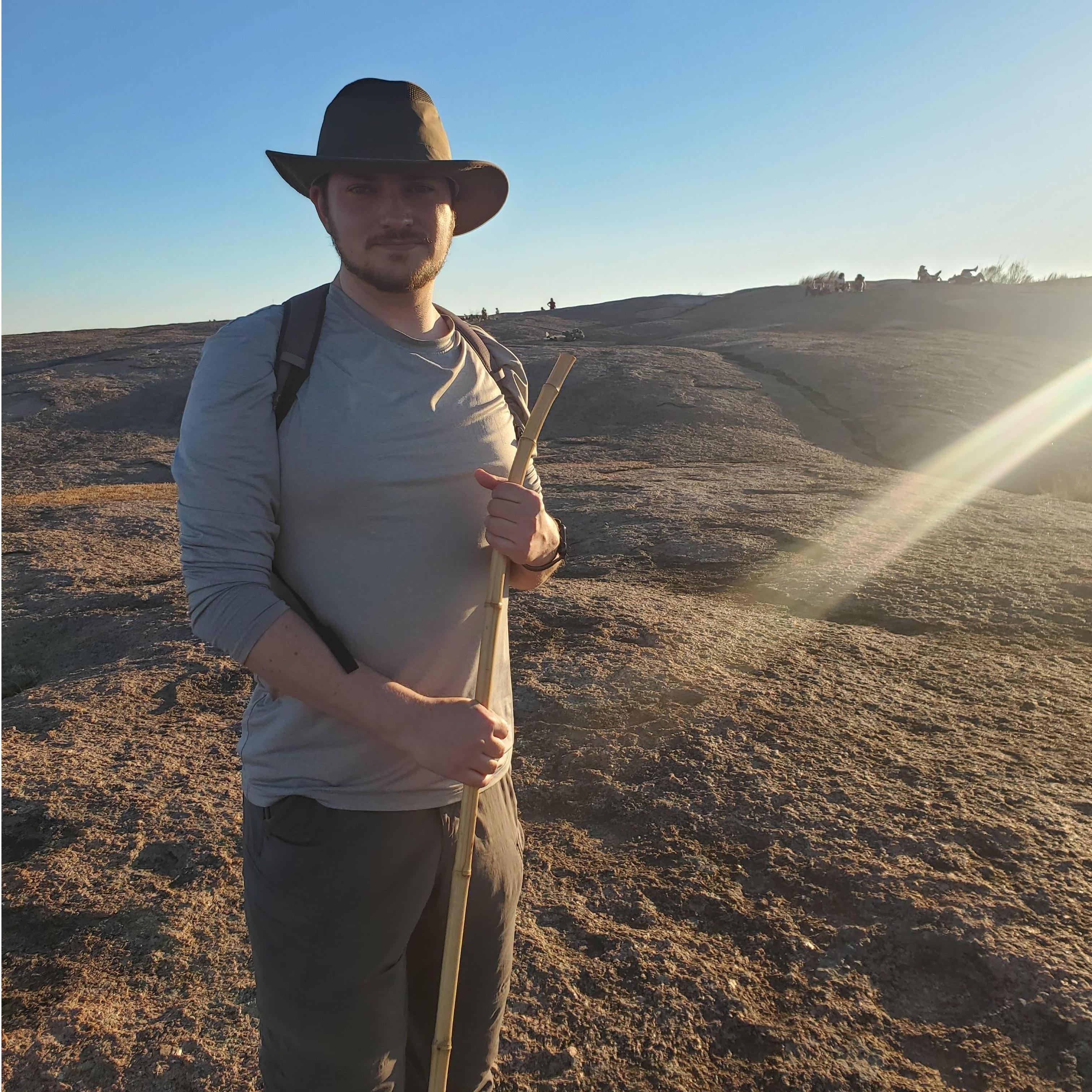 Brian conquered Enchanted Rock, right before the engagement
