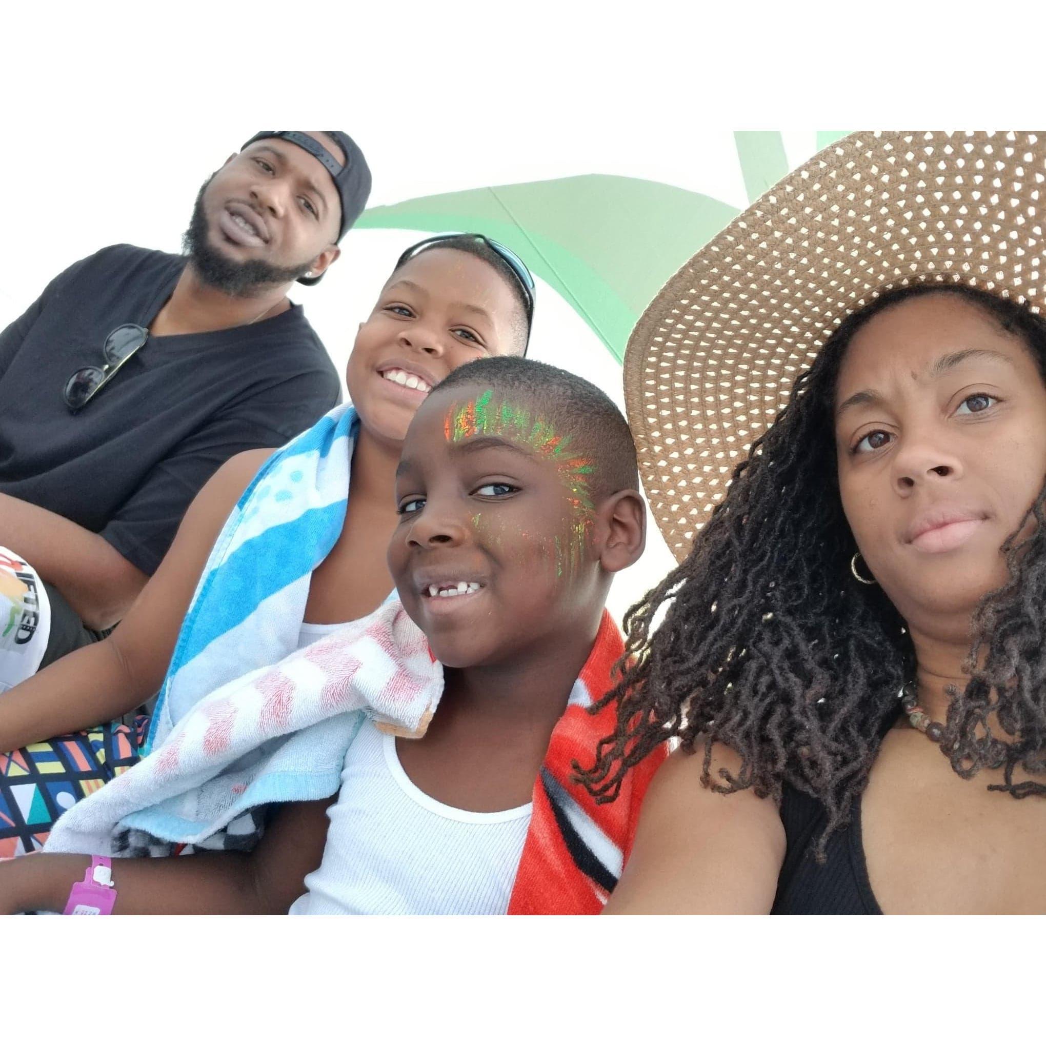 Christmas 2018: This past December, we took the boys on a cruise to the Bahamas. It was all smiles as we waited for the ferry to take us to the private island. The RIDE was a different story!