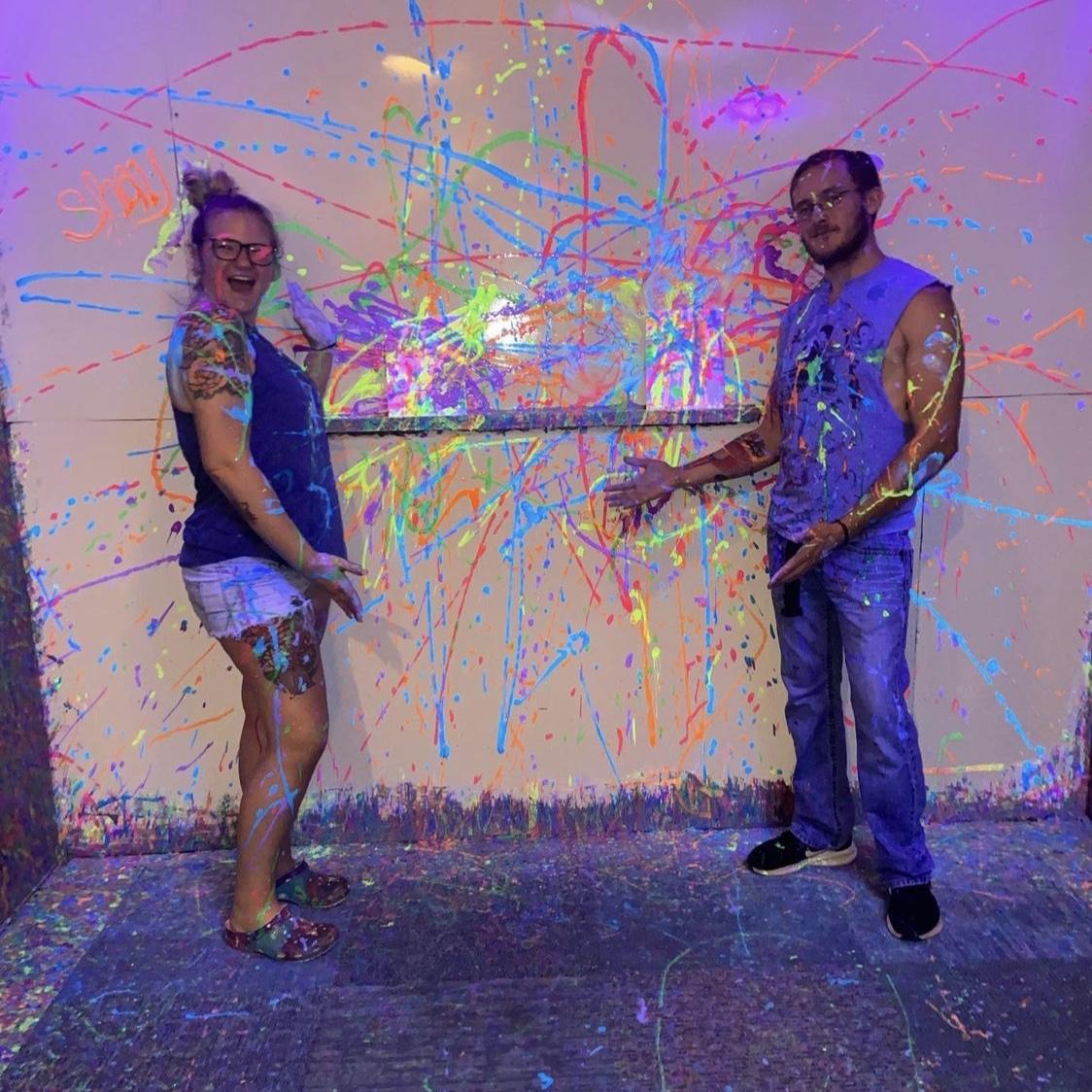 A colorful couple in cahoots