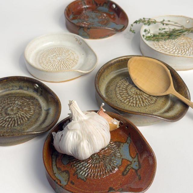 Garlic grater, ginger grater, spoon rest, herb stripper, and olive oil dipper. All-in-one hand made ceramic kitchen gadget and gift!