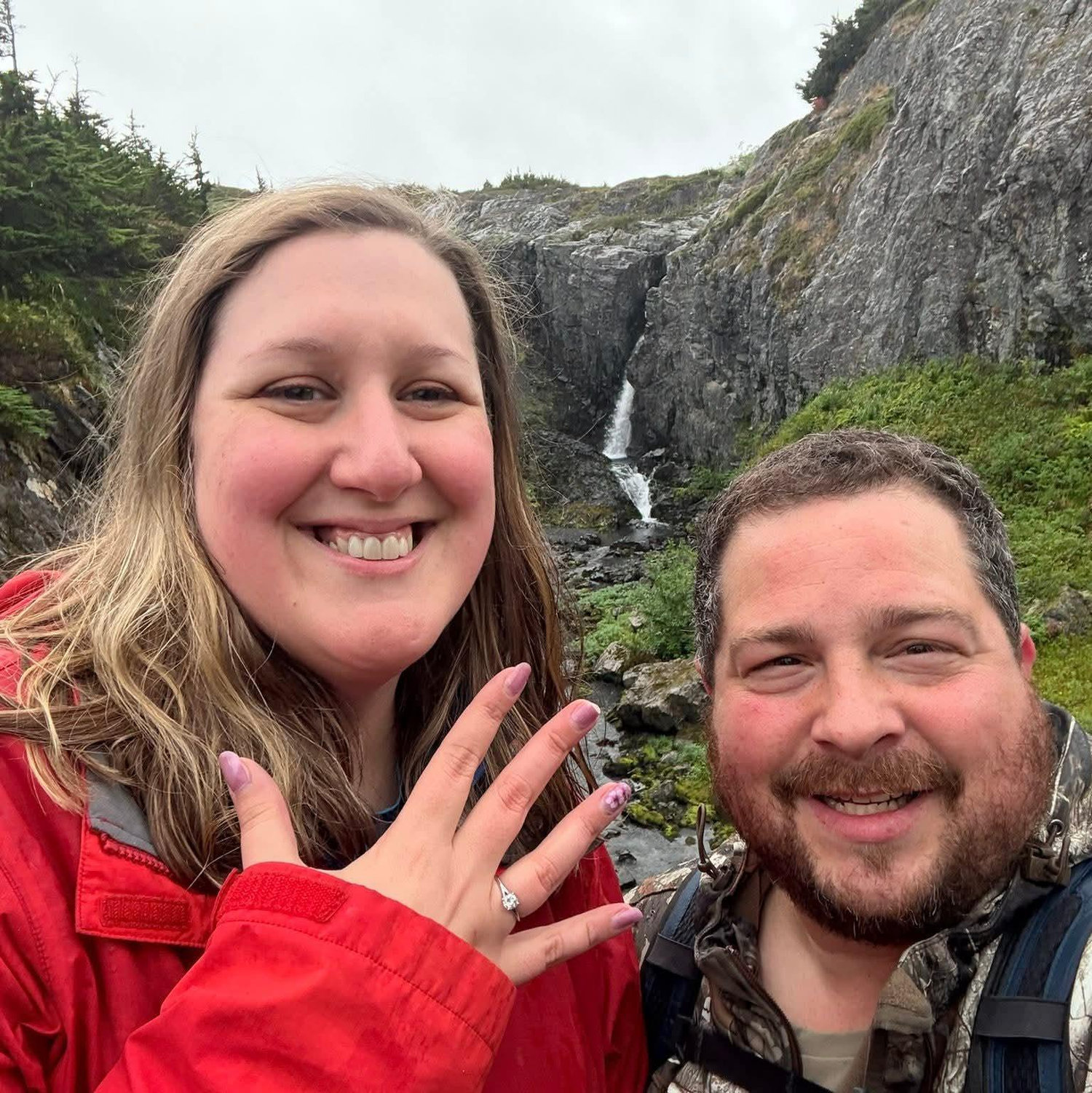Hiking down the mountain freshly engaged!