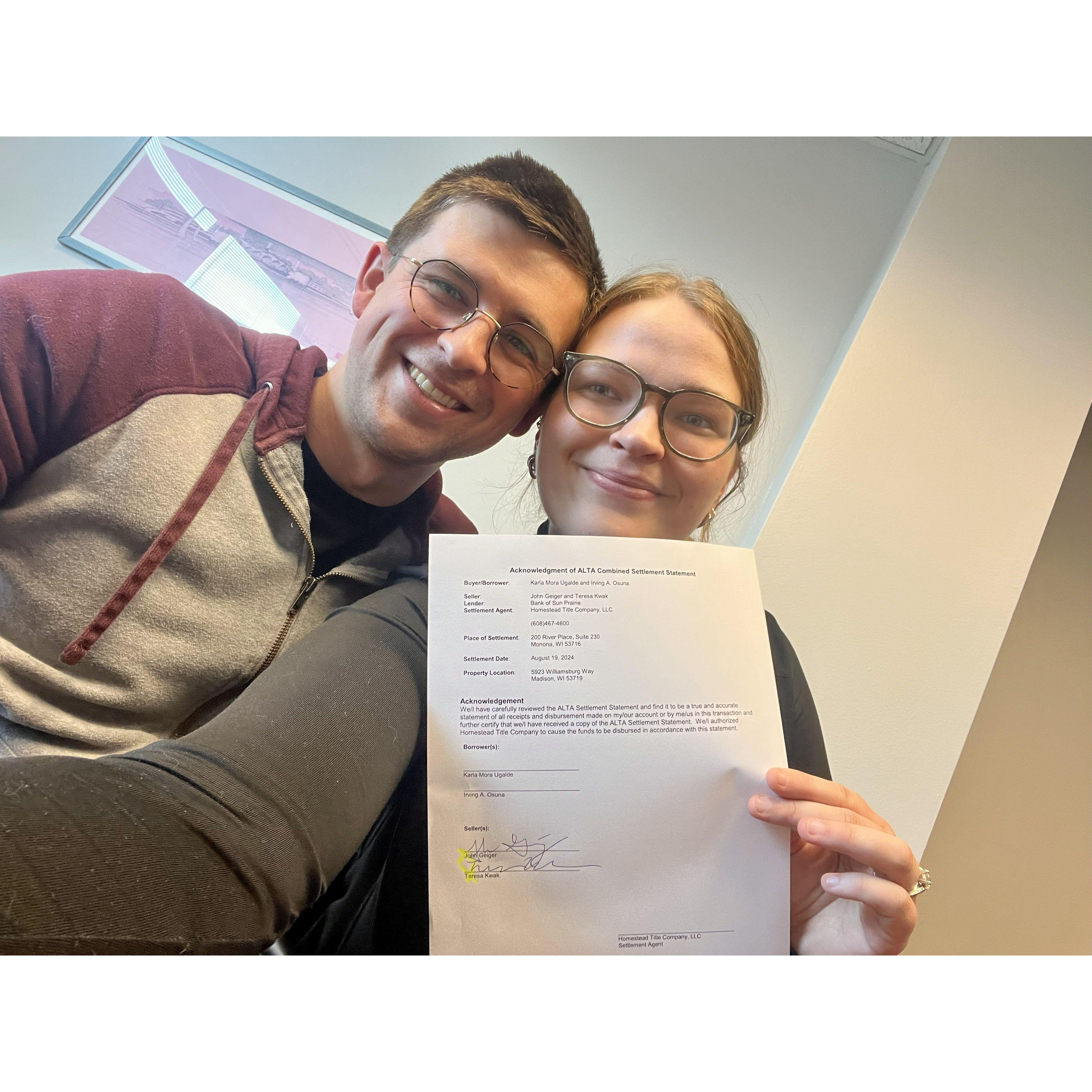 2024 - J and T post-signing paperwork for the Wisco house sale (lots of tears were shed).