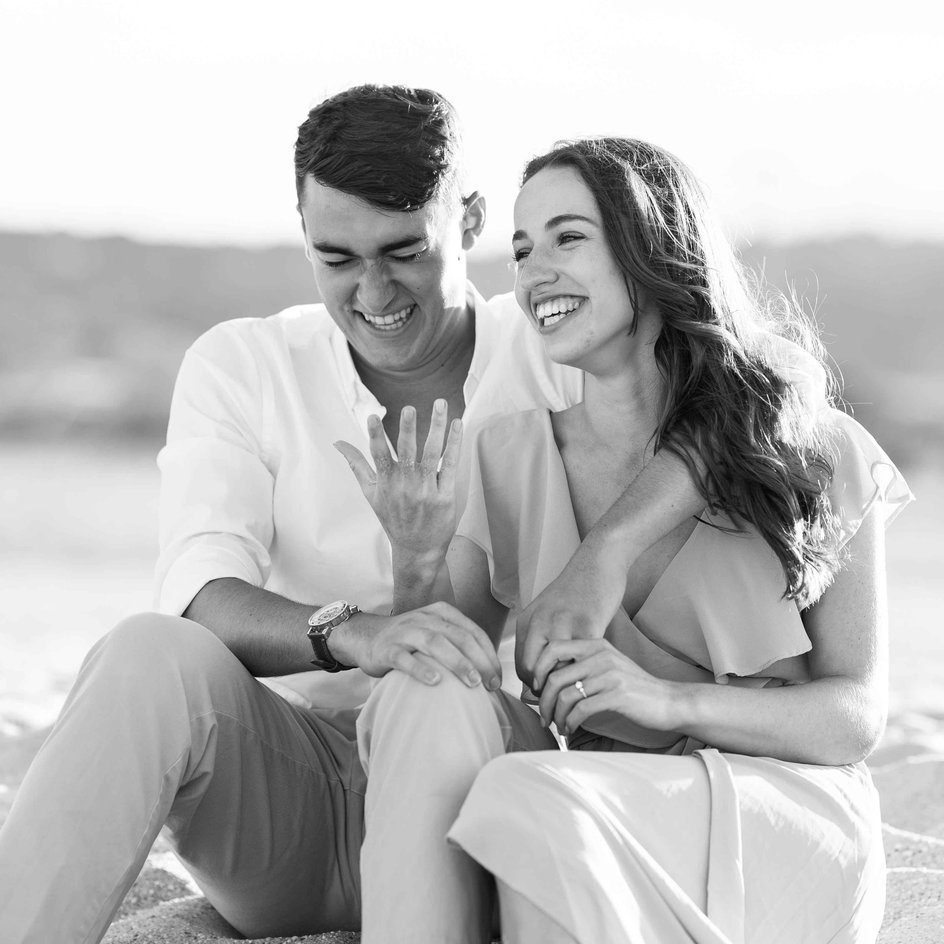 Zack was told to whisper something in Grace's ear to which he chose "chocolate pudding". This is the shot of Grace laughing at him and Zack laughing so hard at himself he cried.