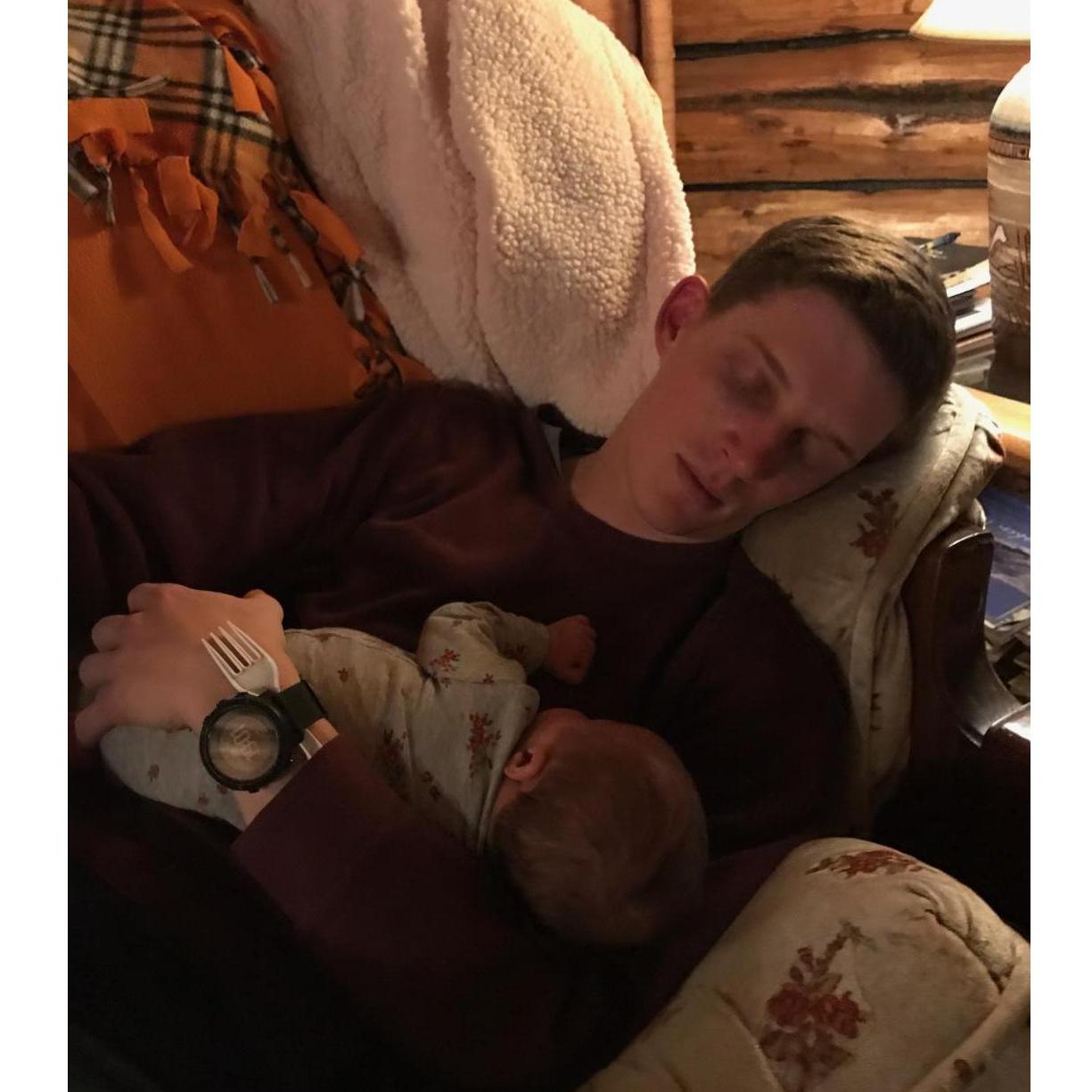 Another adorable picture of Anthony with baby Elena. If you're wondering why Anthony has a fork under his watchband, he fell asleep while waiting for dessert.