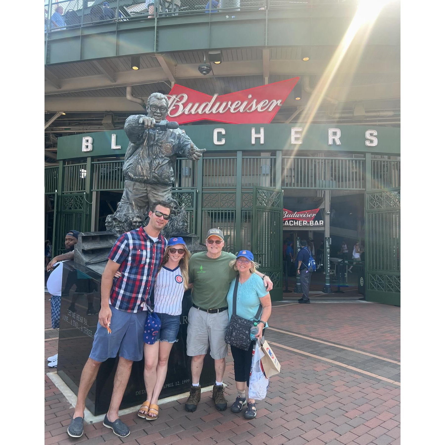 Chelby and Kyle with Chelby's parents, Kip and Heidi, at the Chicago Cubs game when they visited IL in July 2024