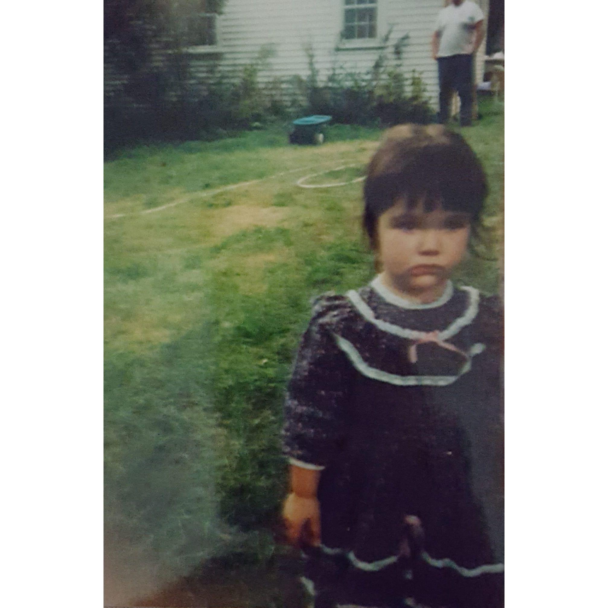 Ashlyn, seen here staring at a ghost somewhere behind the photographer. It's fine.