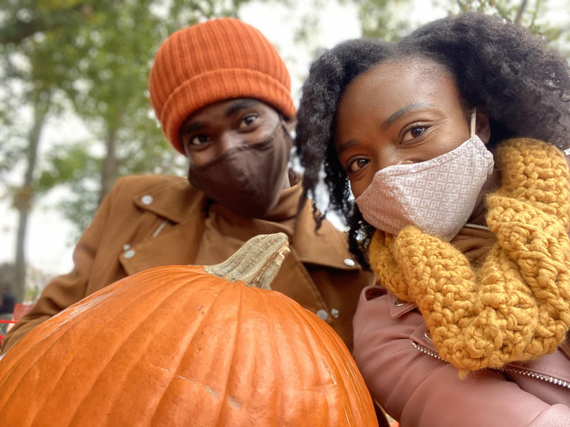 We refused to pay $10.00 for a pumpkin so we crouched done and snuck a picture with one instead!