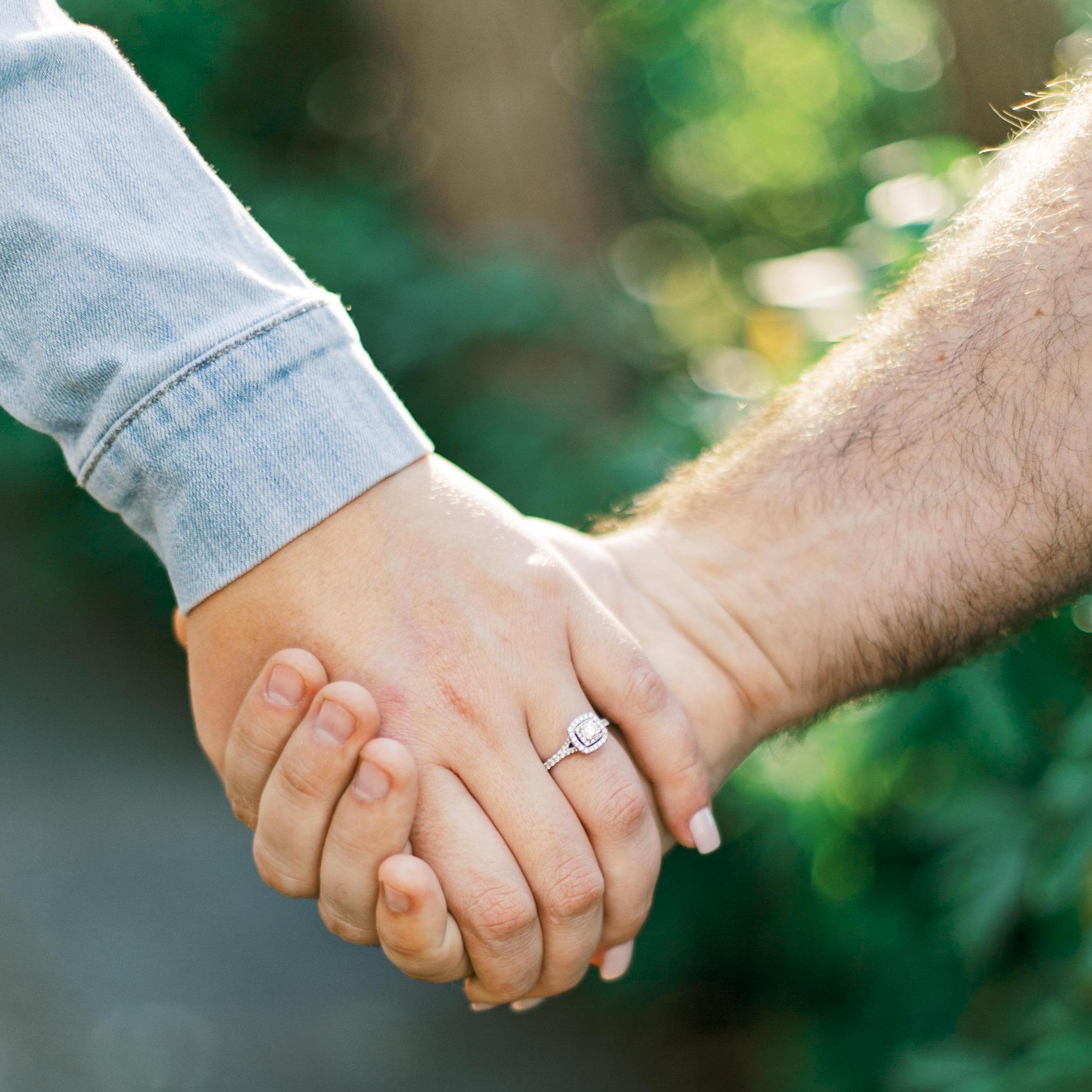 Beautiful ring with a beautiful story: the center diamond came from the wedding ring of Brian's Nana, when Arthur and Rose Reilly both said "I do"