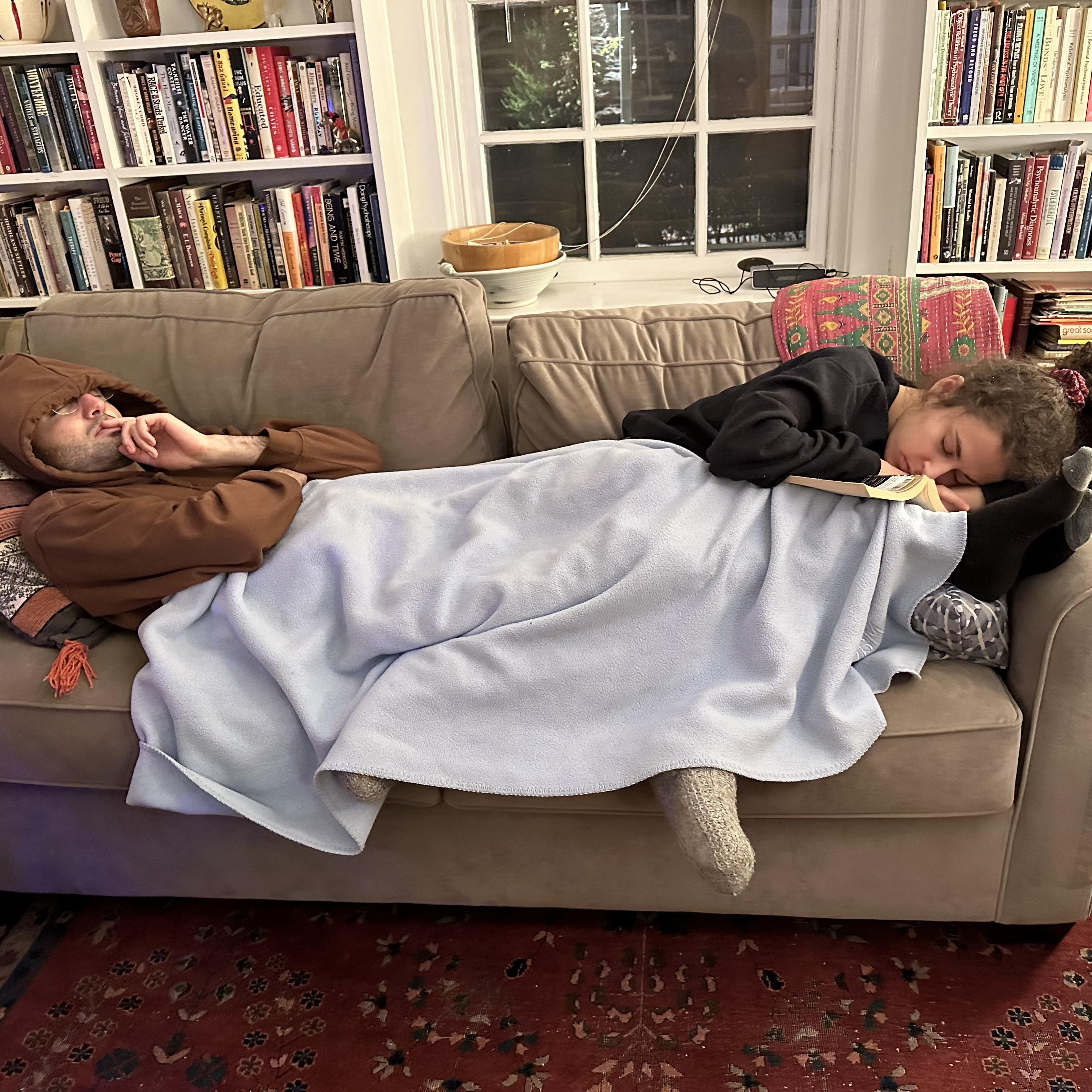 Our first year doing holidays together; a post-Christmas tree decorating nap in Philadelphia before heading to Sudbury (December 2023)