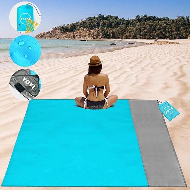 YOYI Beach Blanket, Beach Blanket Sand Proof Oversized for 2-7 Adults, 69''× 82'' Lightweight Pocket Blanket with 4 Corner Pockets, Beach Mat for Travel, Camping, Hiking, Music Festivals, Packable Bag