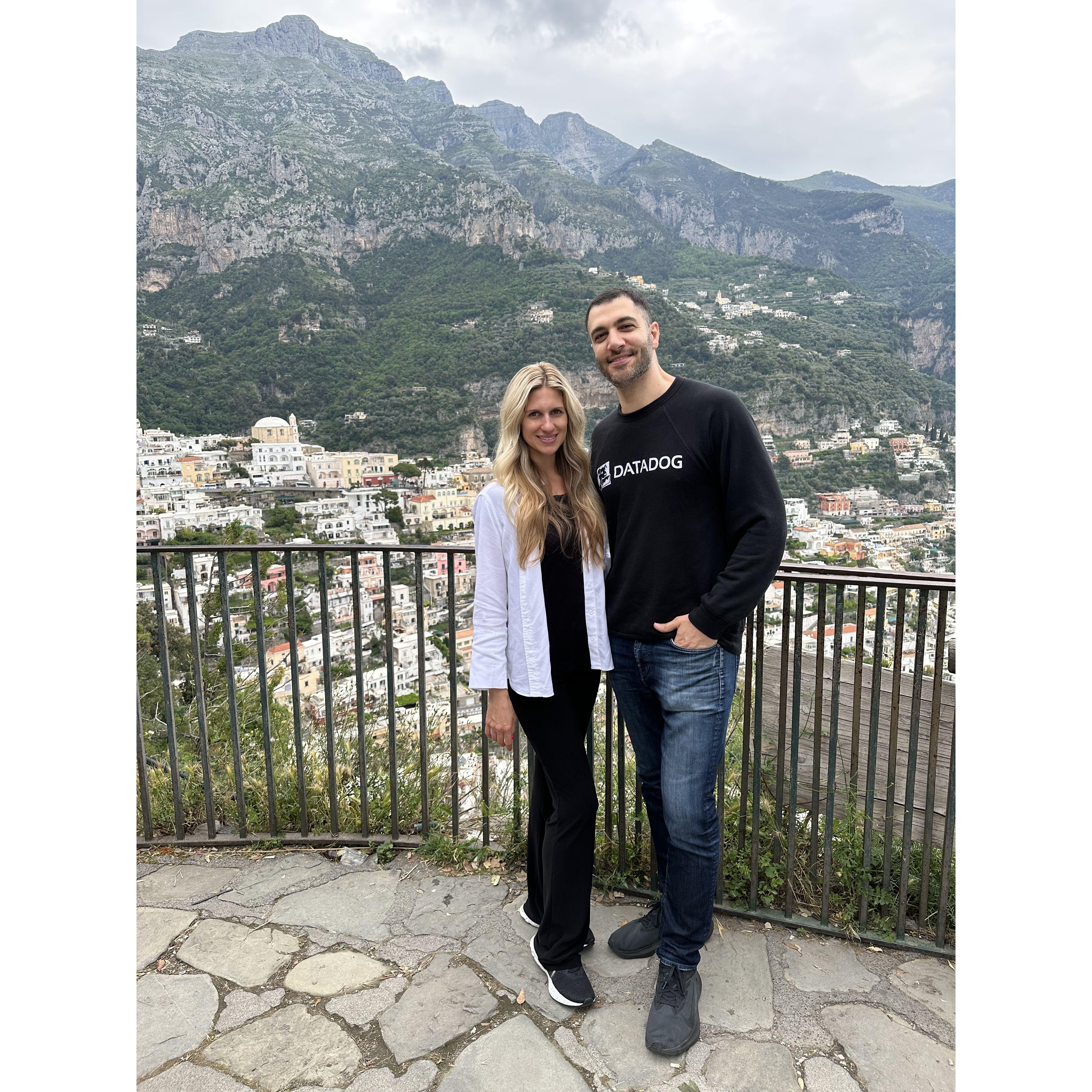Olivia and Faris in Positano, Italy. Their driver pulled over to the side of the road to snap this photo of them.