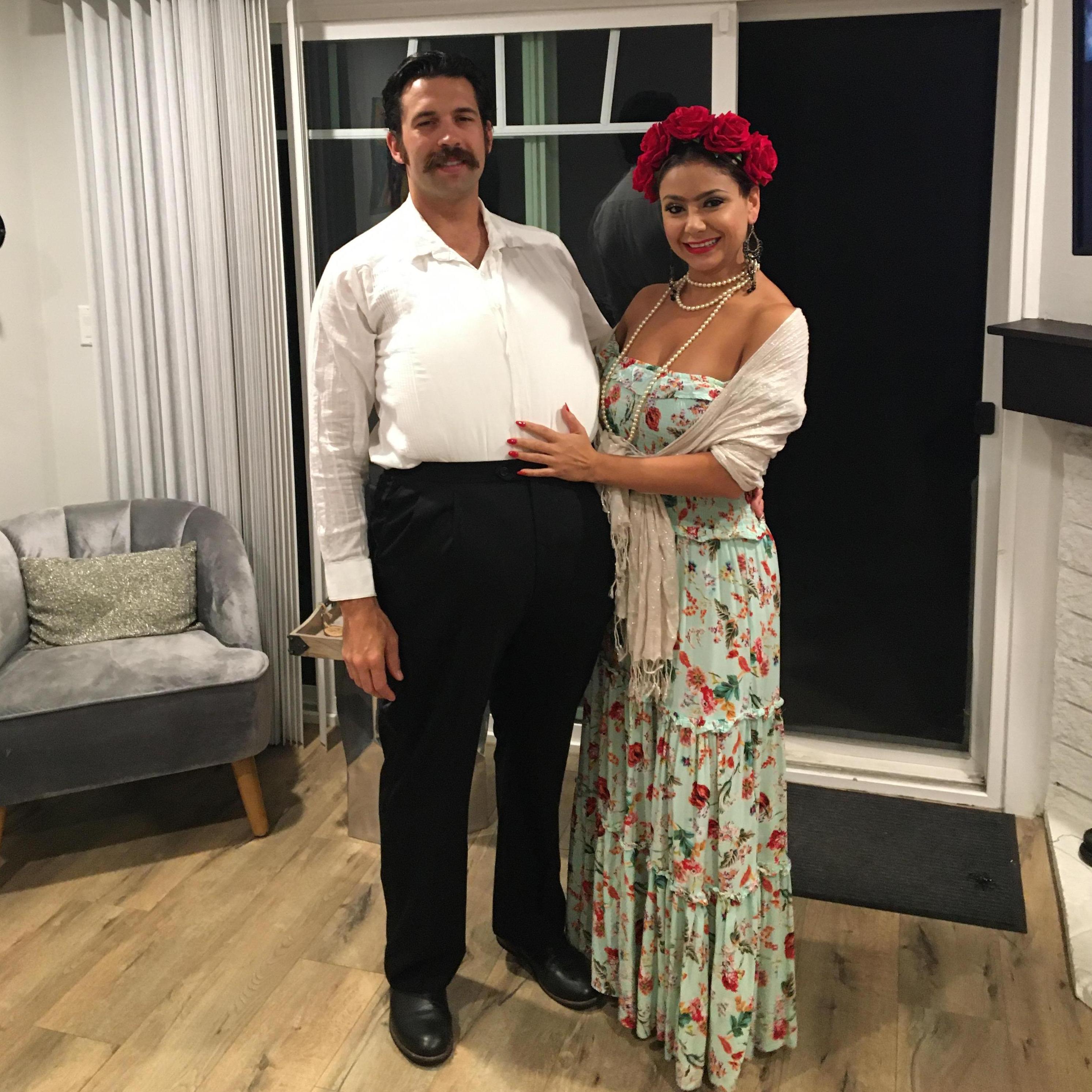 For Halloween, we dressed up as Frida Kahlo and Diego Riviera, famous Mexican painters and lovers.
The mustache is real. Sadly, the unibrow is not.