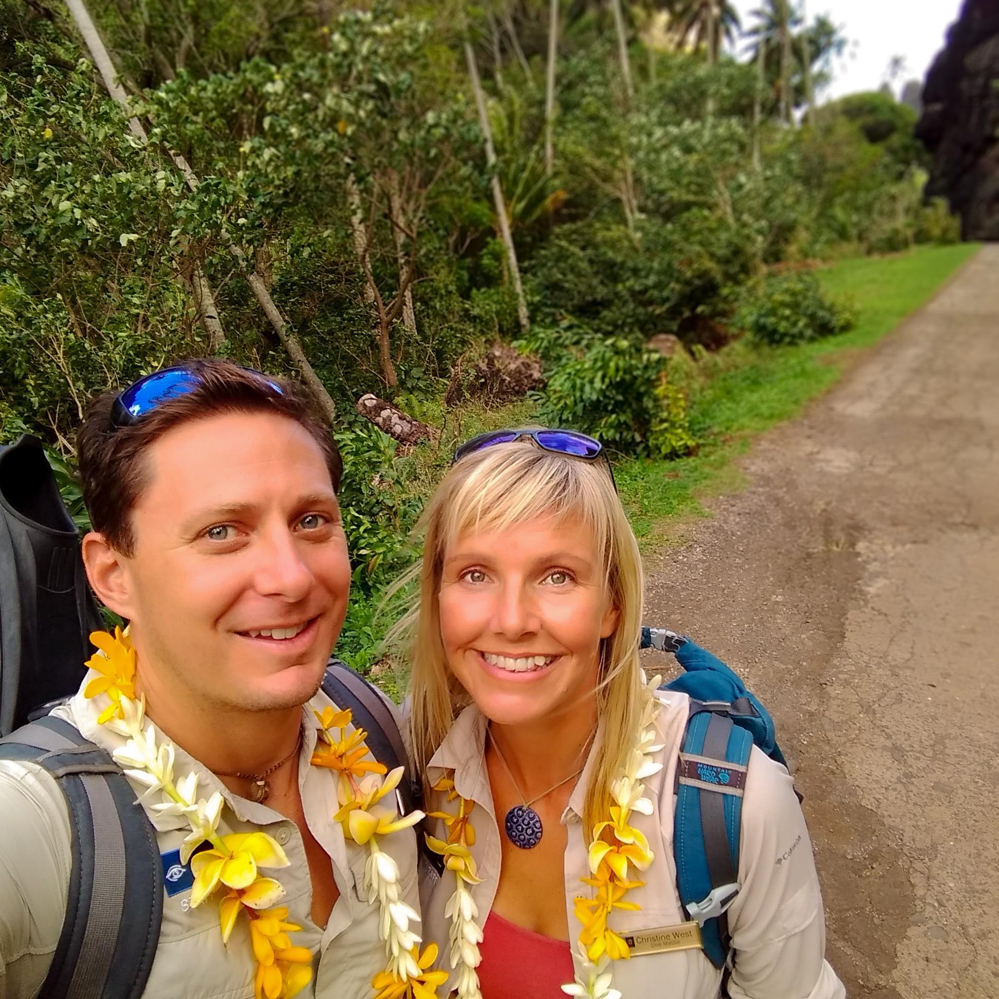 Leis and tropical hikes in the Marquesas in French Polynesia. Our life together has included visiting so many places that were more beautiful than we expected. This was no exception.