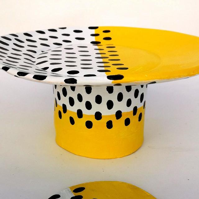 Yellow dot cake stand