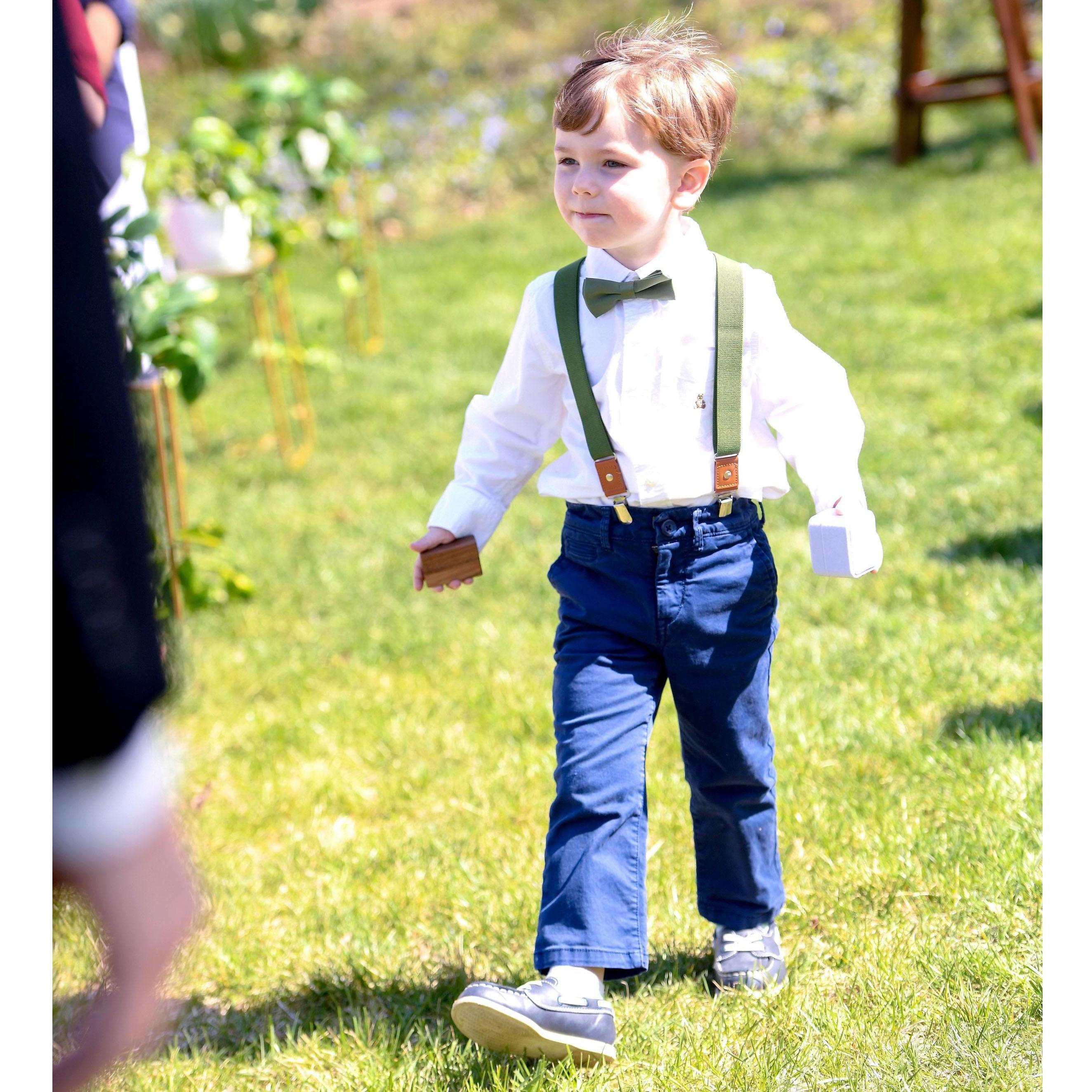 Sebastian Hood carried the rings down the aisle. We wondered if he might throw them in the pond, but he performed beautifully and isn't to blame for any of the times we've lost our rings since then.