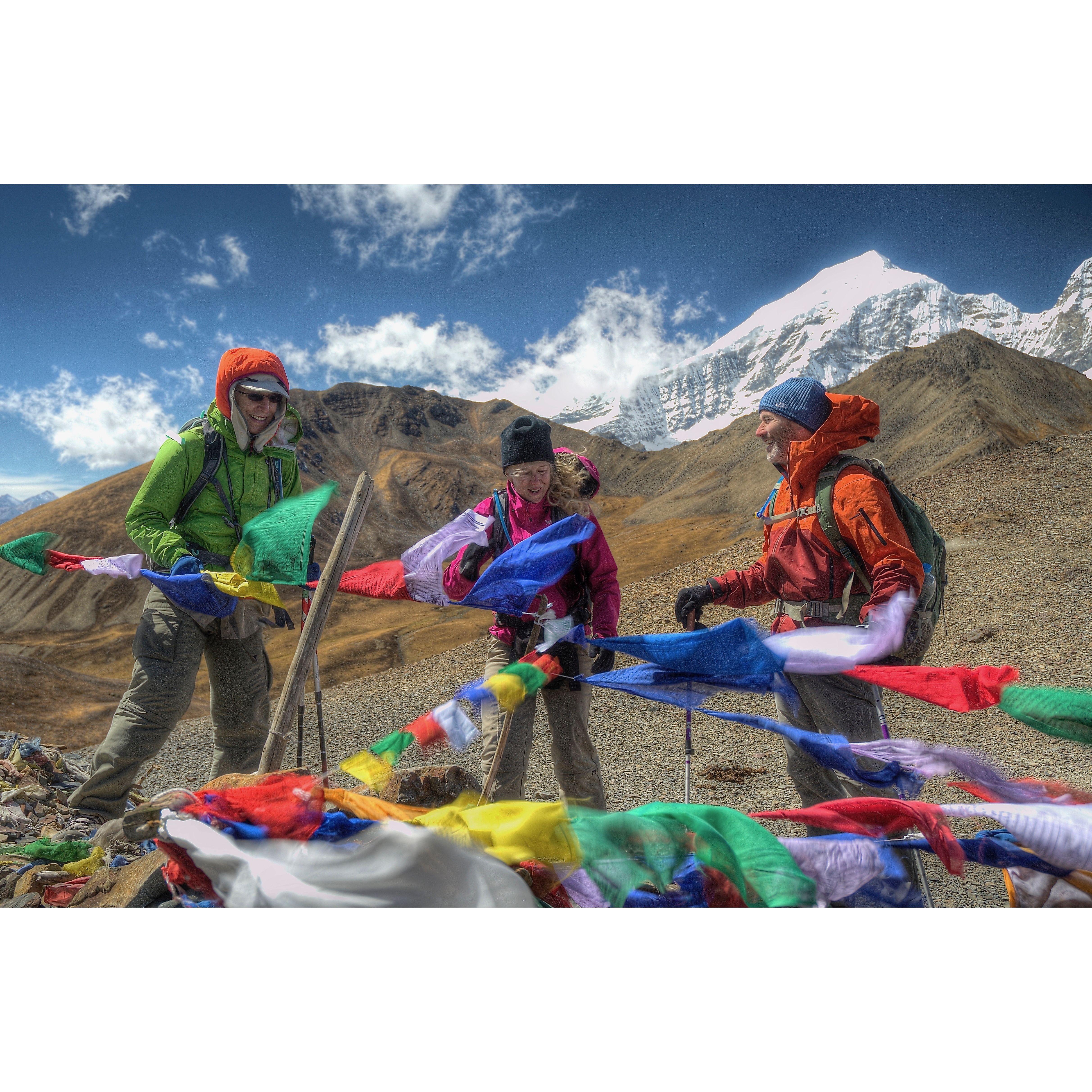 Bhutan pass and adding prayer flags along the way.  October 2014